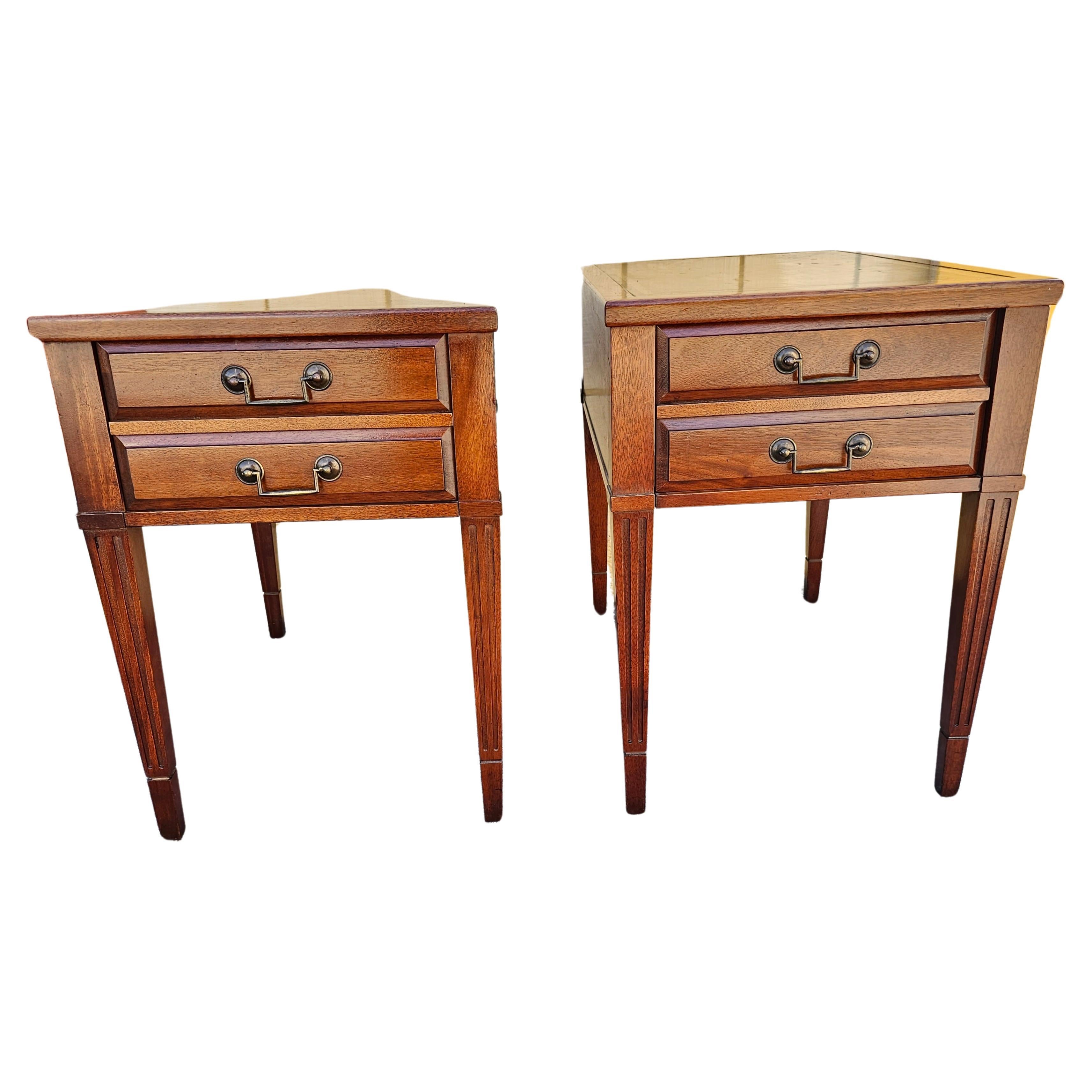 A pair Mid-Century Mersman Mahogany and Stenciled Leather Top Side Tables with large single drawer .
Measures 17