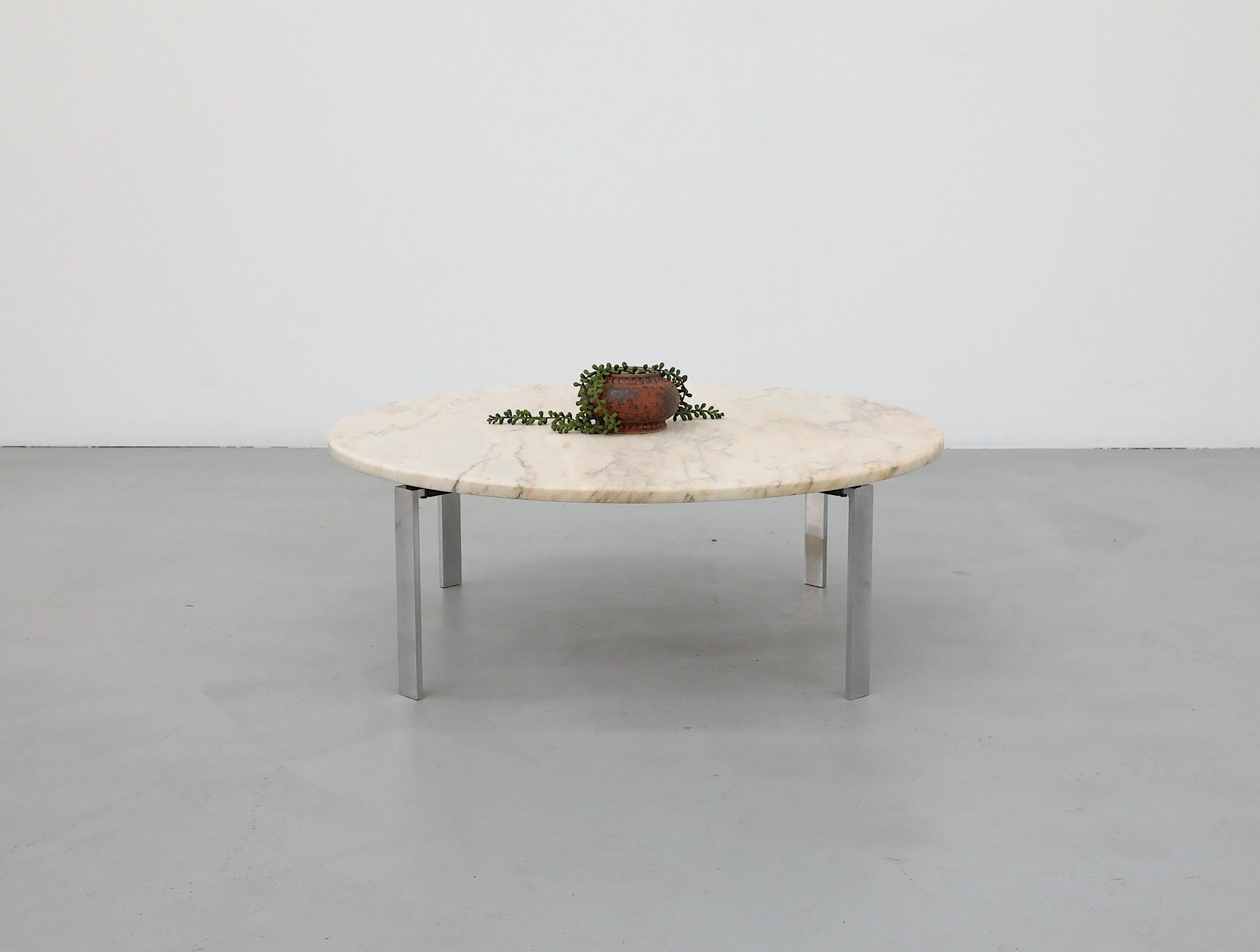 Mid-Century Metaform chrome coffee table base with vintage marble top. The marble top is not original to the table, one side is polished and has a thick sealant, the other side has been lightly sanded and is raw marble. The frame is in original