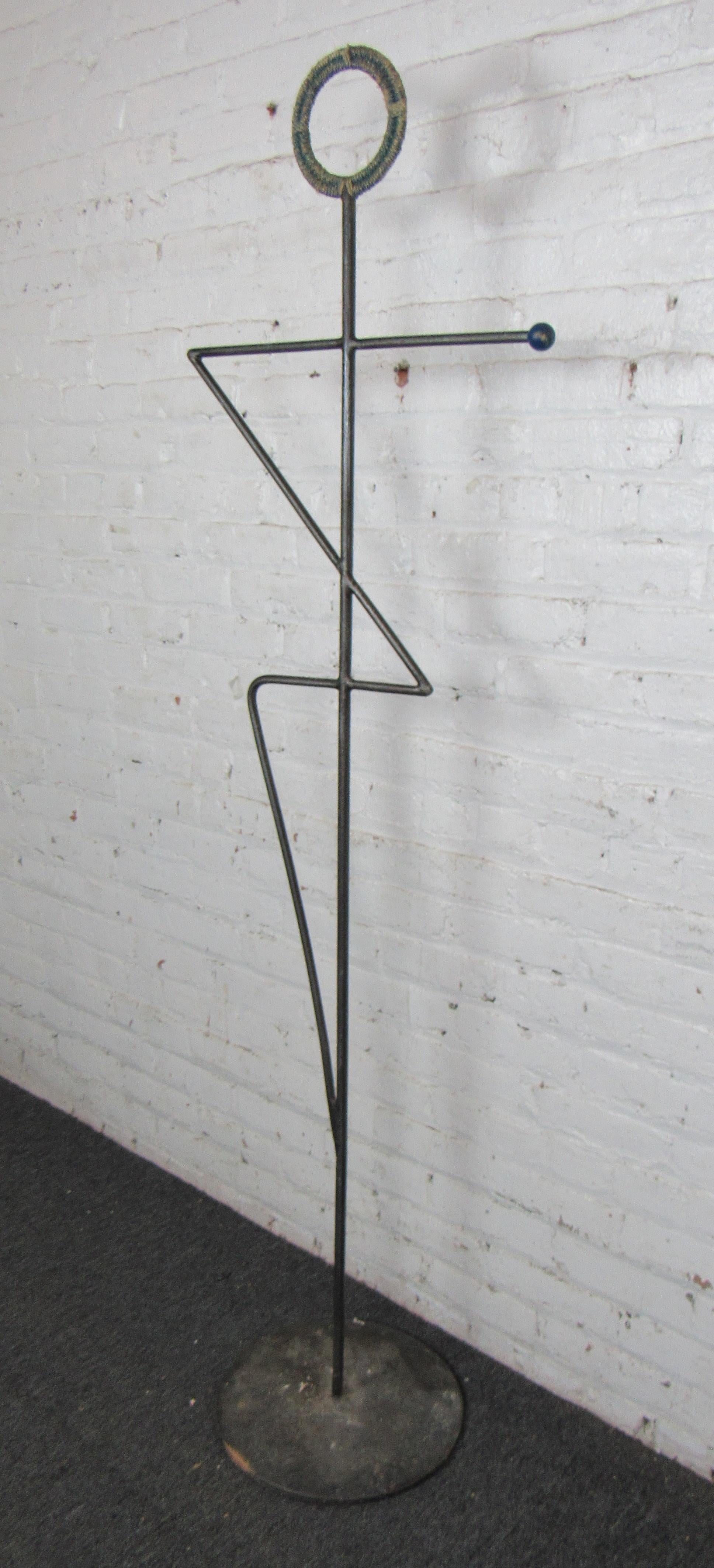 Mid-century design metal coat hanger. Rope wrapped hat/coat hanger on top with a blue dye. 
(Please confirm item location - NY or NJ - with dealer).
 