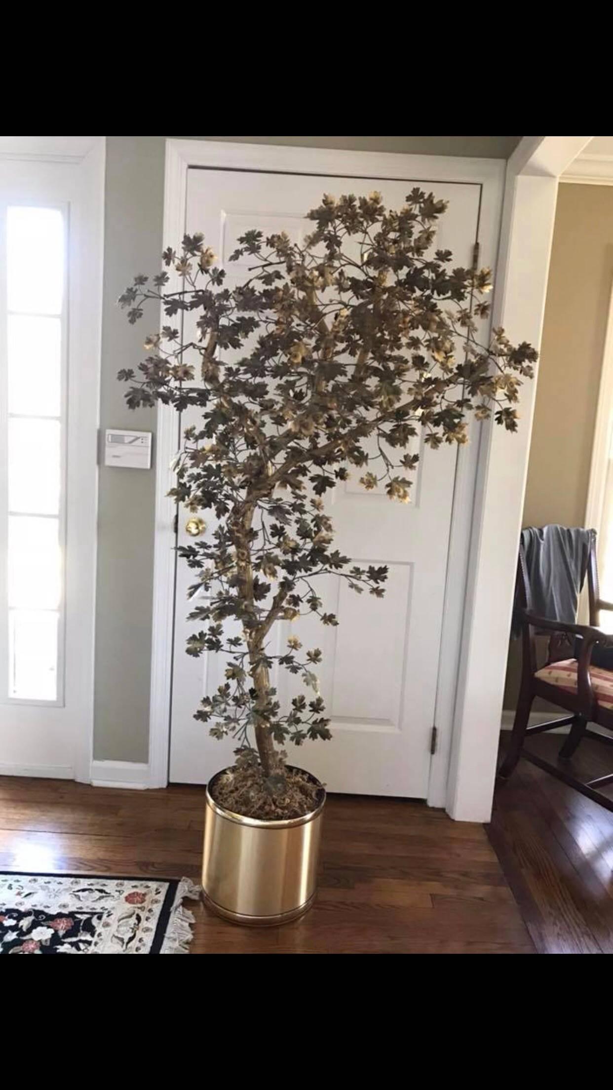 Midcentury metallic tree attributed to Curtis Jere. Brass basket or planter with real gilded tree branches and brass mixed metal maple shaped leaves. Strong and sturdy. Would be a great accent piece in any room. Bring nature indoors! No detectable