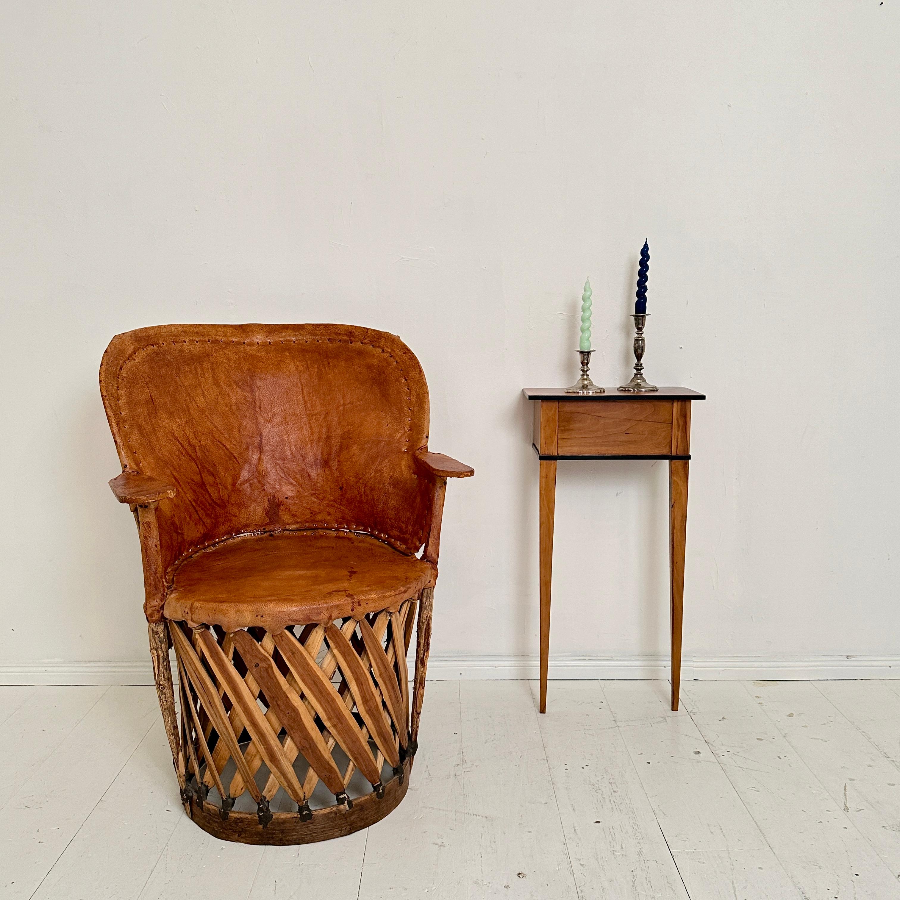 Tribal Mid Century Mexican Equipales Armchair in Leather and Wood, around 1970 For Sale