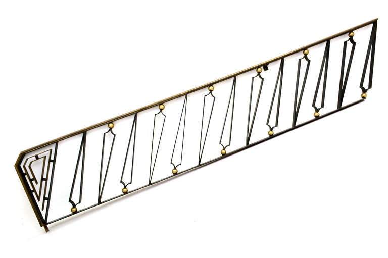 For your consideration a handrail produced in Mexico City circa 1950s by Talleres Chacon. 

Executed in forged iron and brass accents. 

Talleres Chacon produced custom orders of forged iron and brass. Working with the best designers of the
