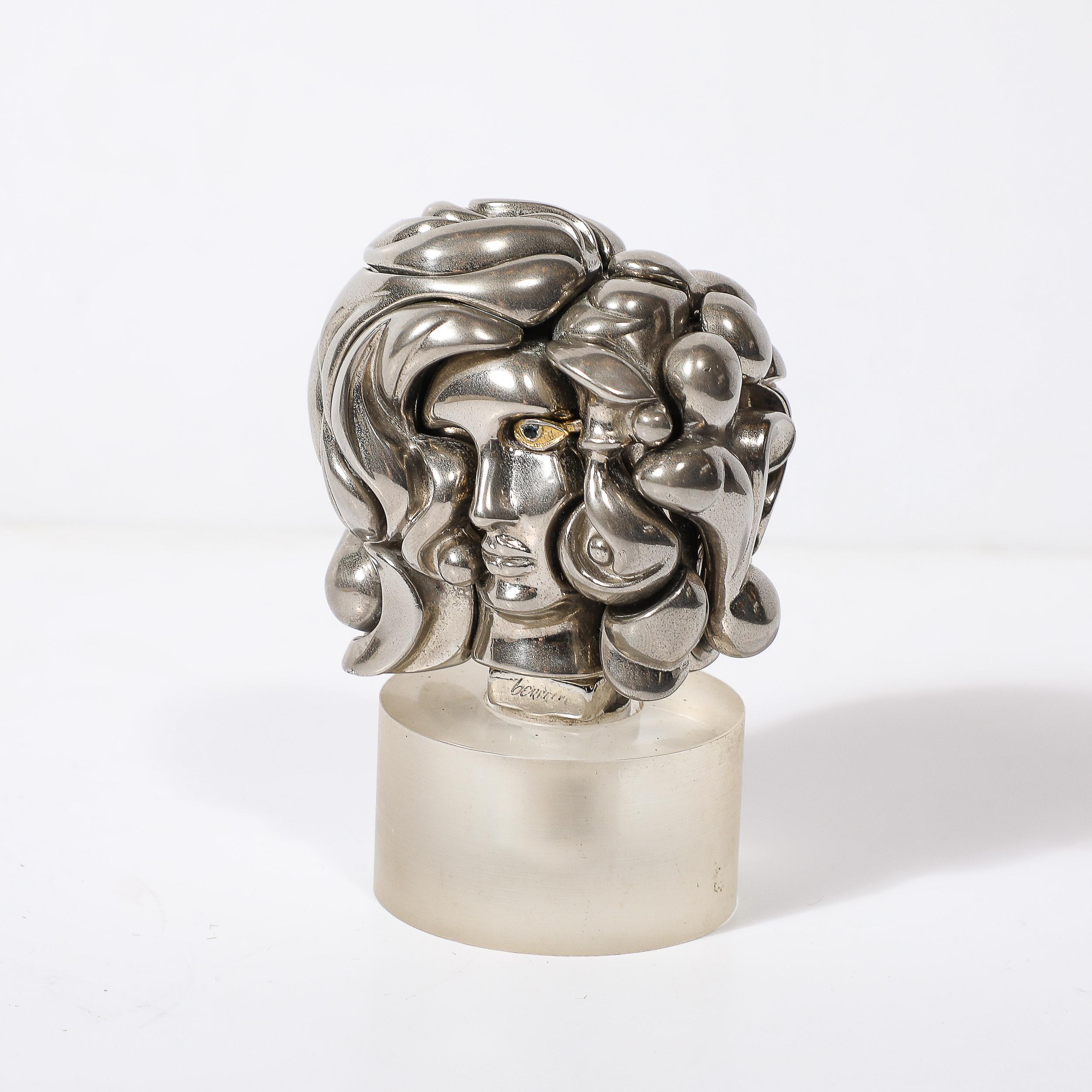 This exquisite Mid-Century Modernist mini puzzle sculpture, titled 