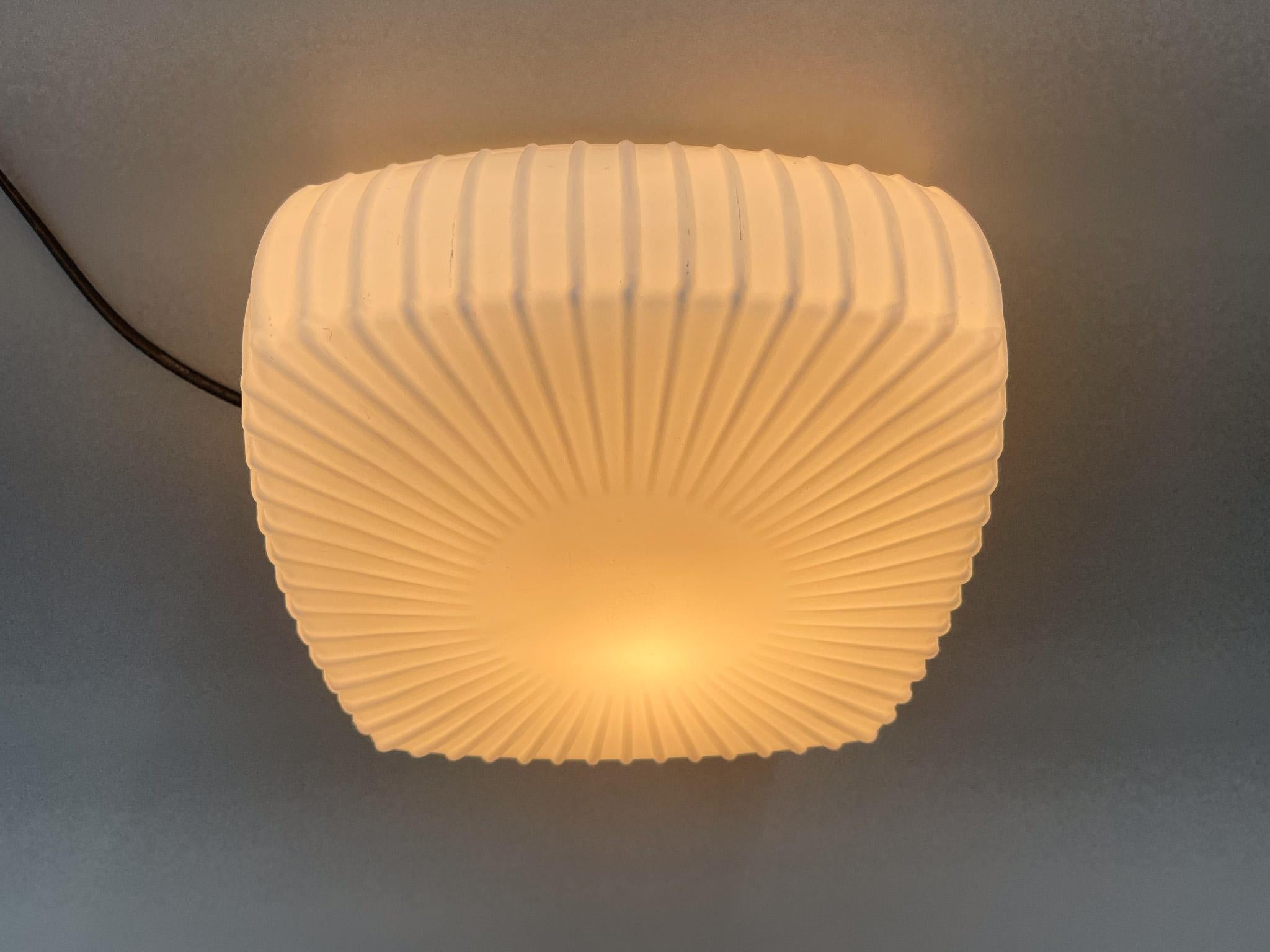 Vintage square milk glass ceiling or wall light made in former Czechoslovakia in the 1970's.
