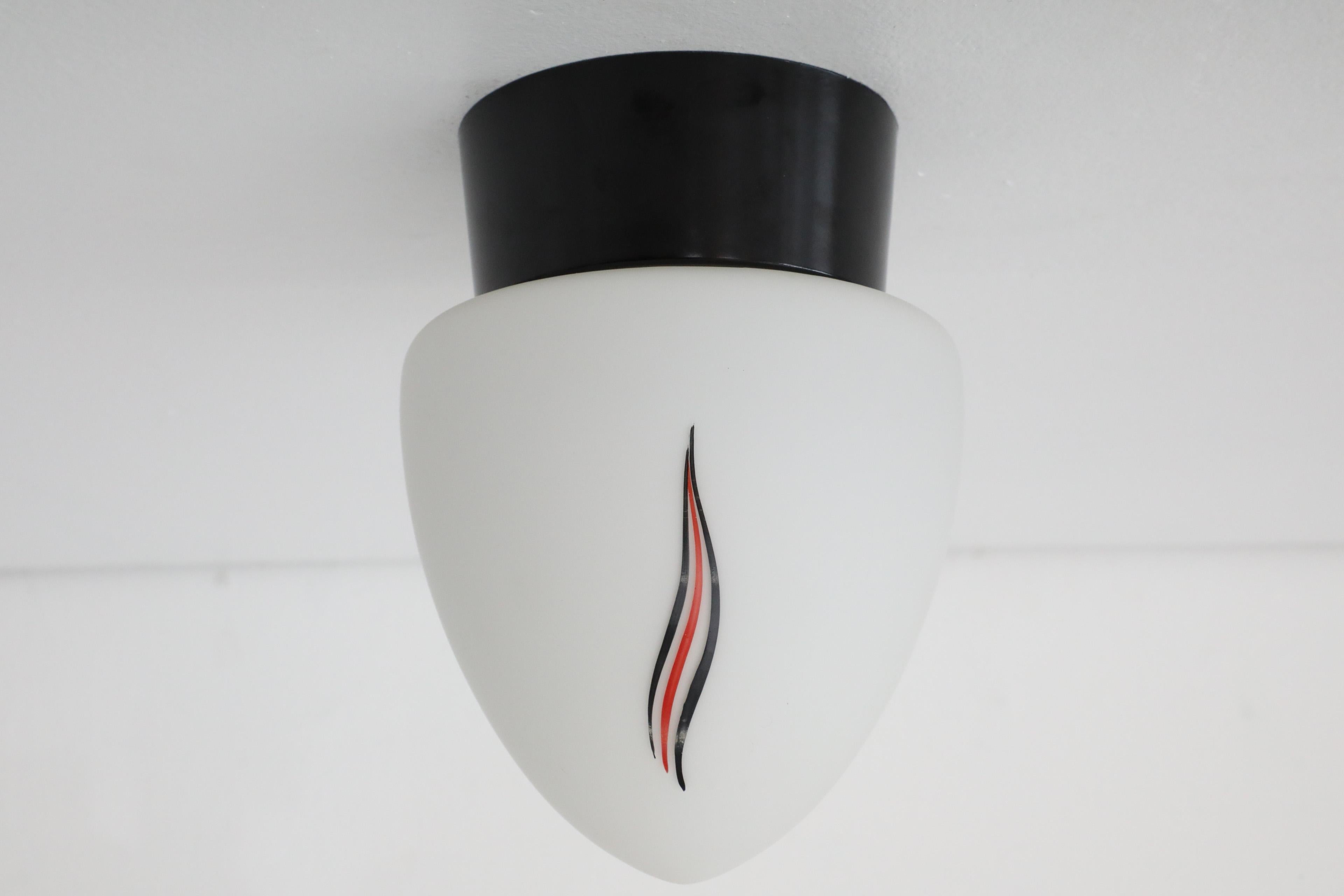 Mid-Century Milk Glass Sconce with Printed Flame Detail and Black Acrylic Base 5