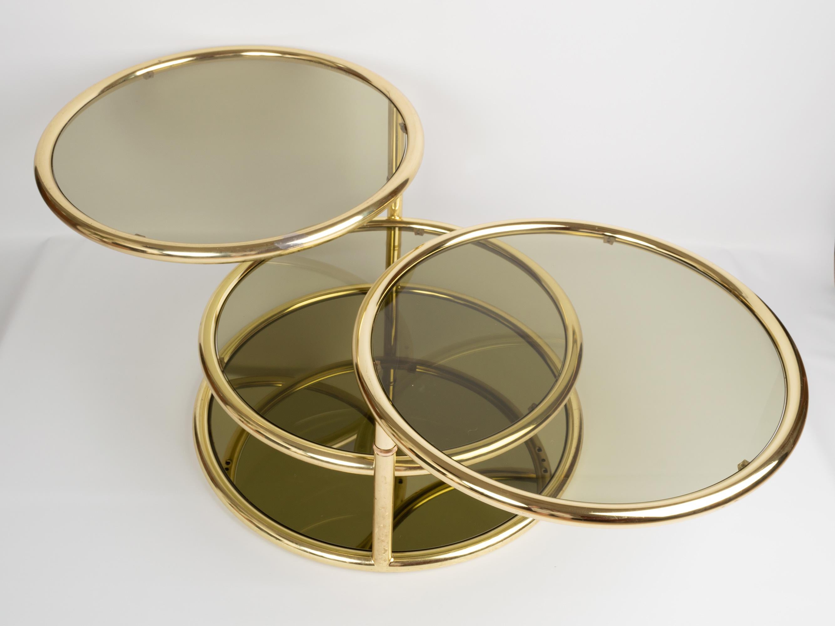 Smoked Glass Midcentury Circular Brass Swivel Tiered Coffee Cocktail Table, attributed to DIA For Sale