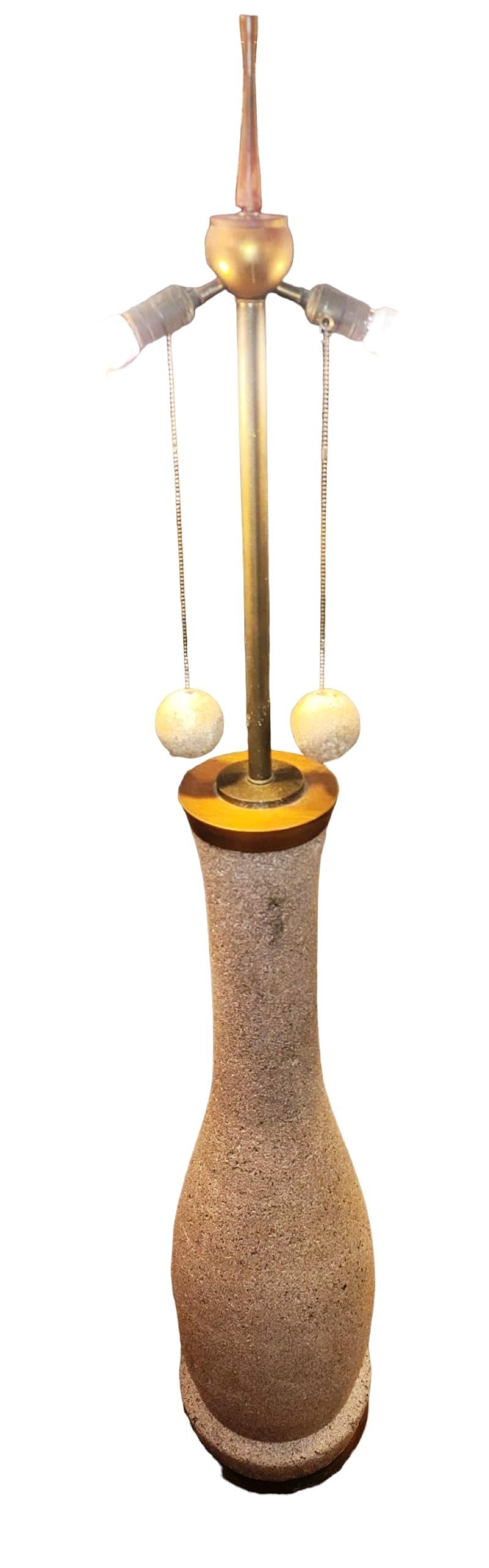 Milo Baughman corked floor lamp design With Wooden Base. Double light design with pull on/ pull off mechanism. Lights are tested and in working condition as shown in the added video.