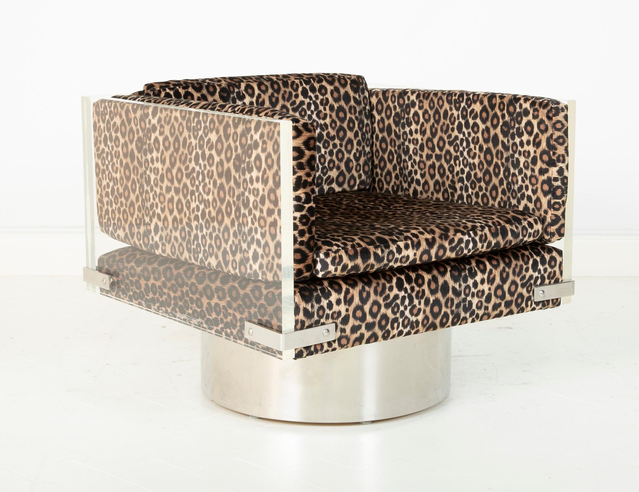 Midcentury Milo Baughman Lucite and chrome swivel chair with new leopard velvet upholstery.