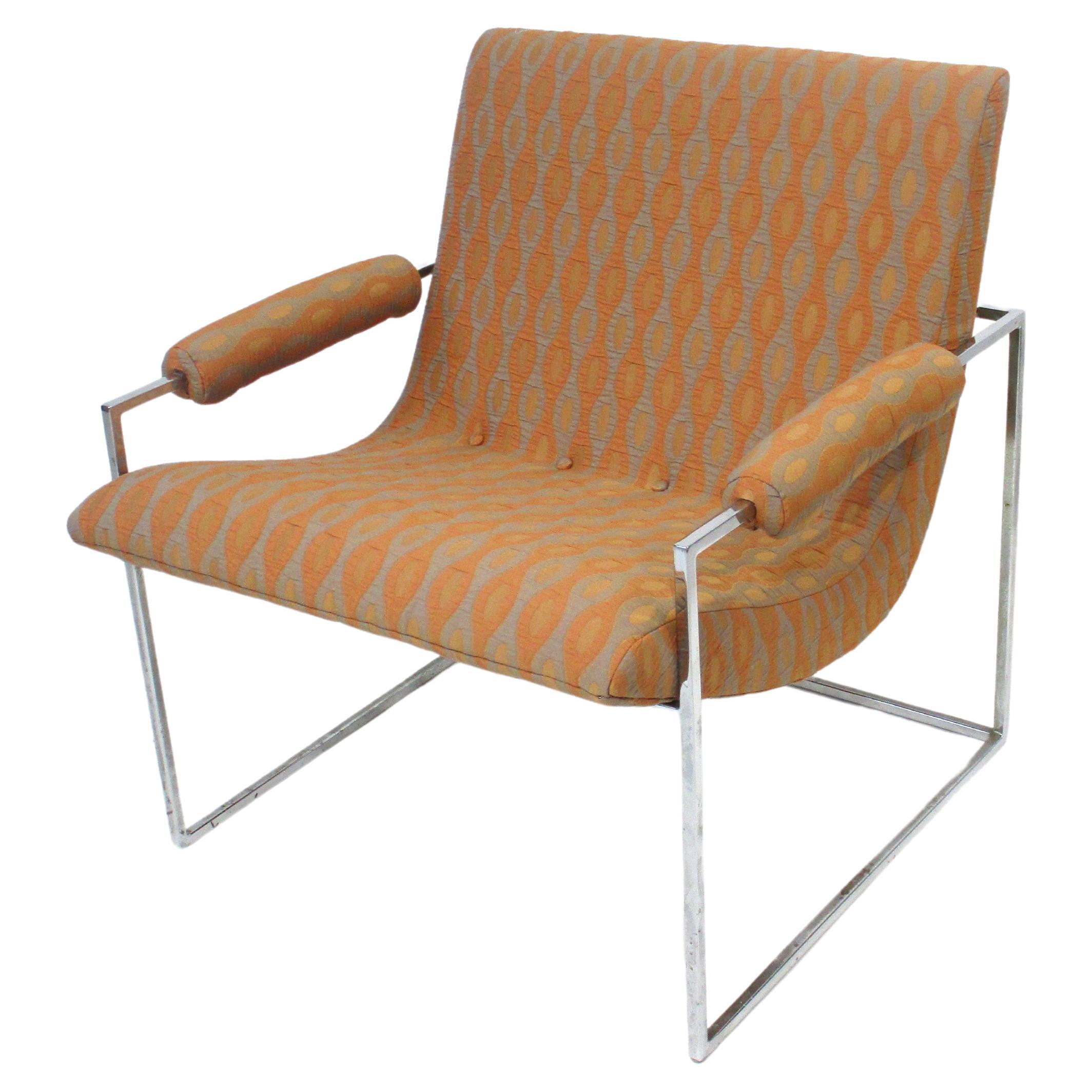 A very well crafted chromed squared tubed framed lounge chair with scoop styled seat and rolled armrests making this a super comfortable chair . The frame structure makes the seat appear to float giving it a light appearance and reupholstered in a