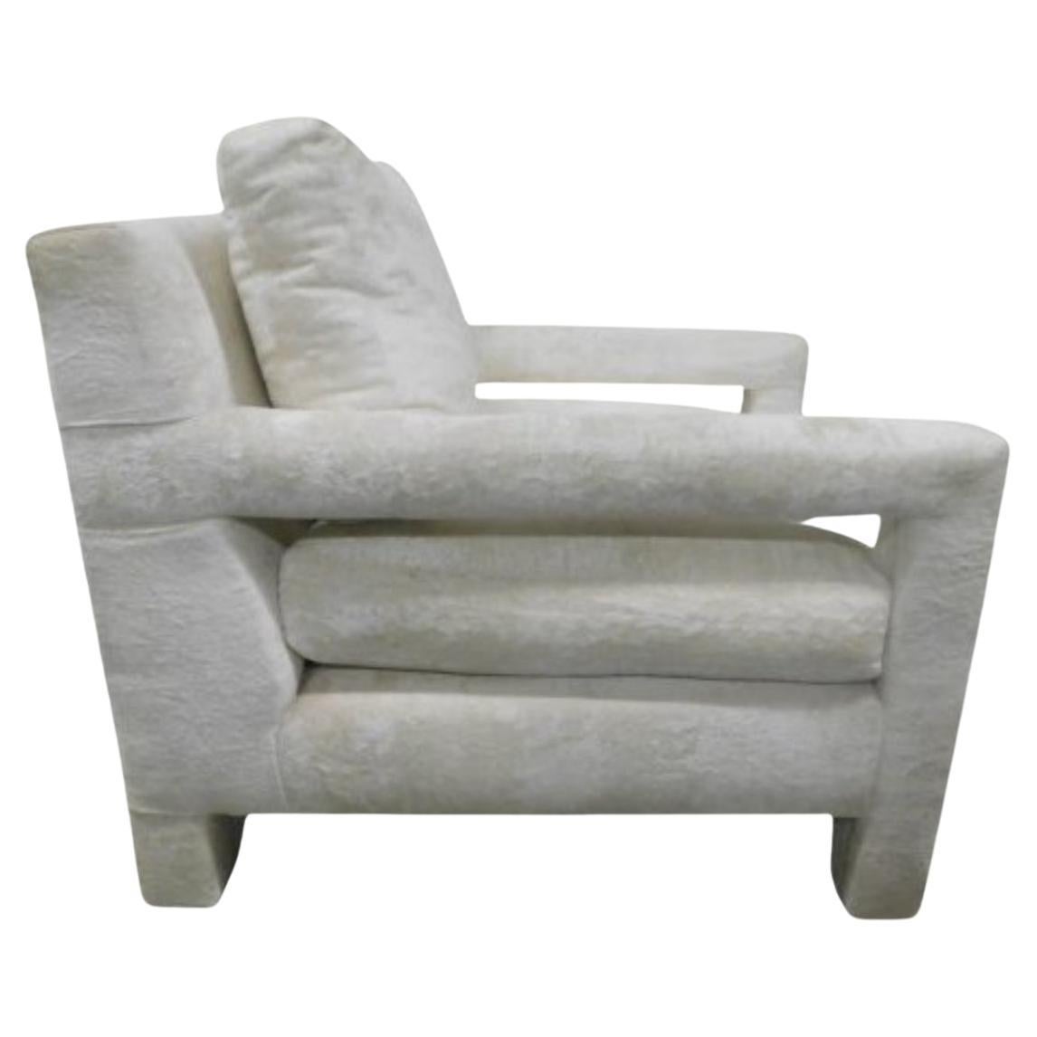 Mid century modern Milo Baughman Style Parson Chair & Ottoman. White Crushed velvet upholstery in good vintage condition. Ready for use. Located in Brooklyn NYC.

Dimensions: 
Chair 33” deep x 29” wide x 28” tall - SH 16”
Ottoman 30” x 24” x 17”