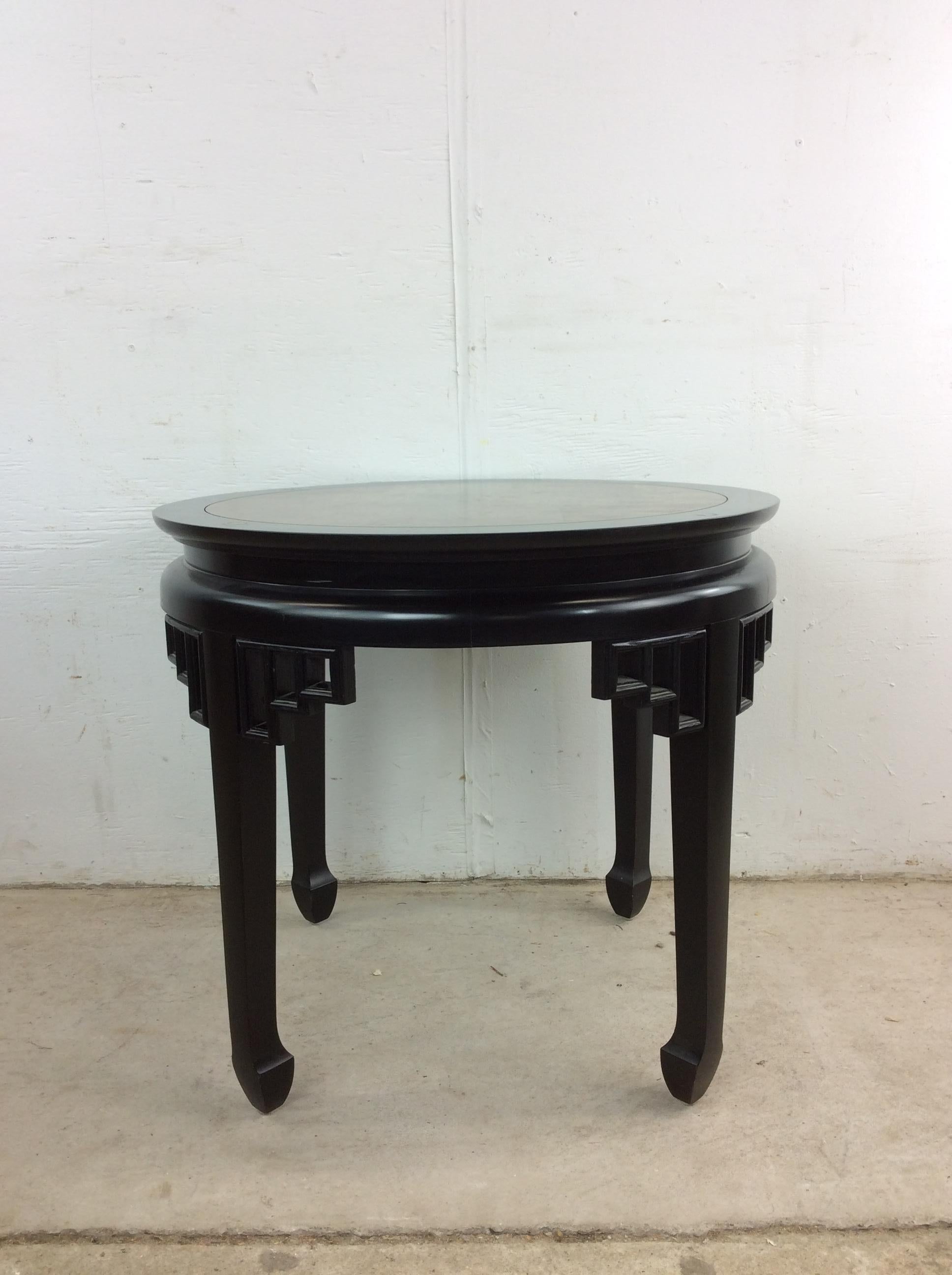 This mid century Ming style end table features hardwood construction, black lacquer finish, beautiful burlwood top, unique Ming style detailing on legs and base. Optional glass top available.  Matching cocktail table available