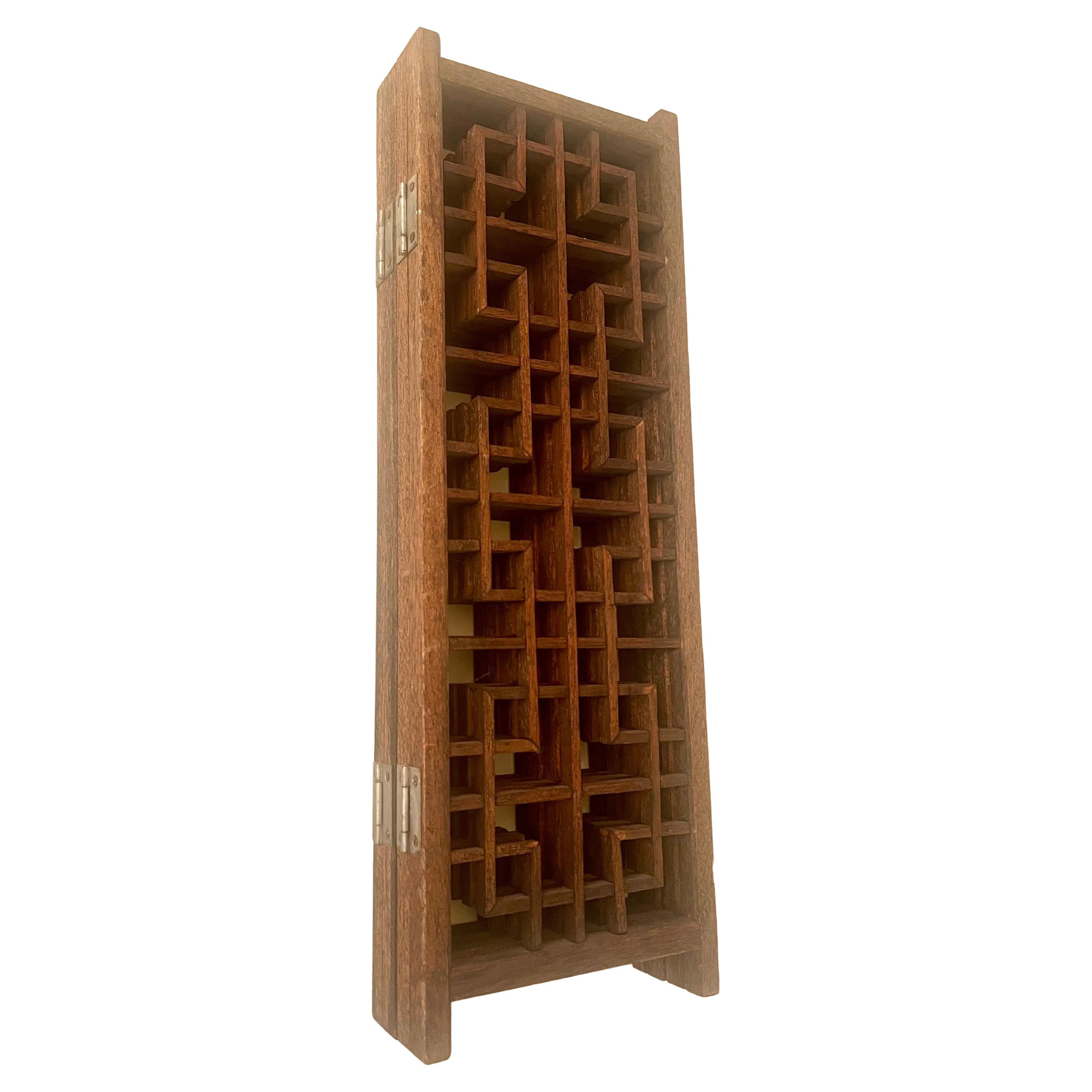 A very cool and hard to find mini four panel teak folding screen with intricate square lattice design, circa 1970s. Each individual panel measures 6.5