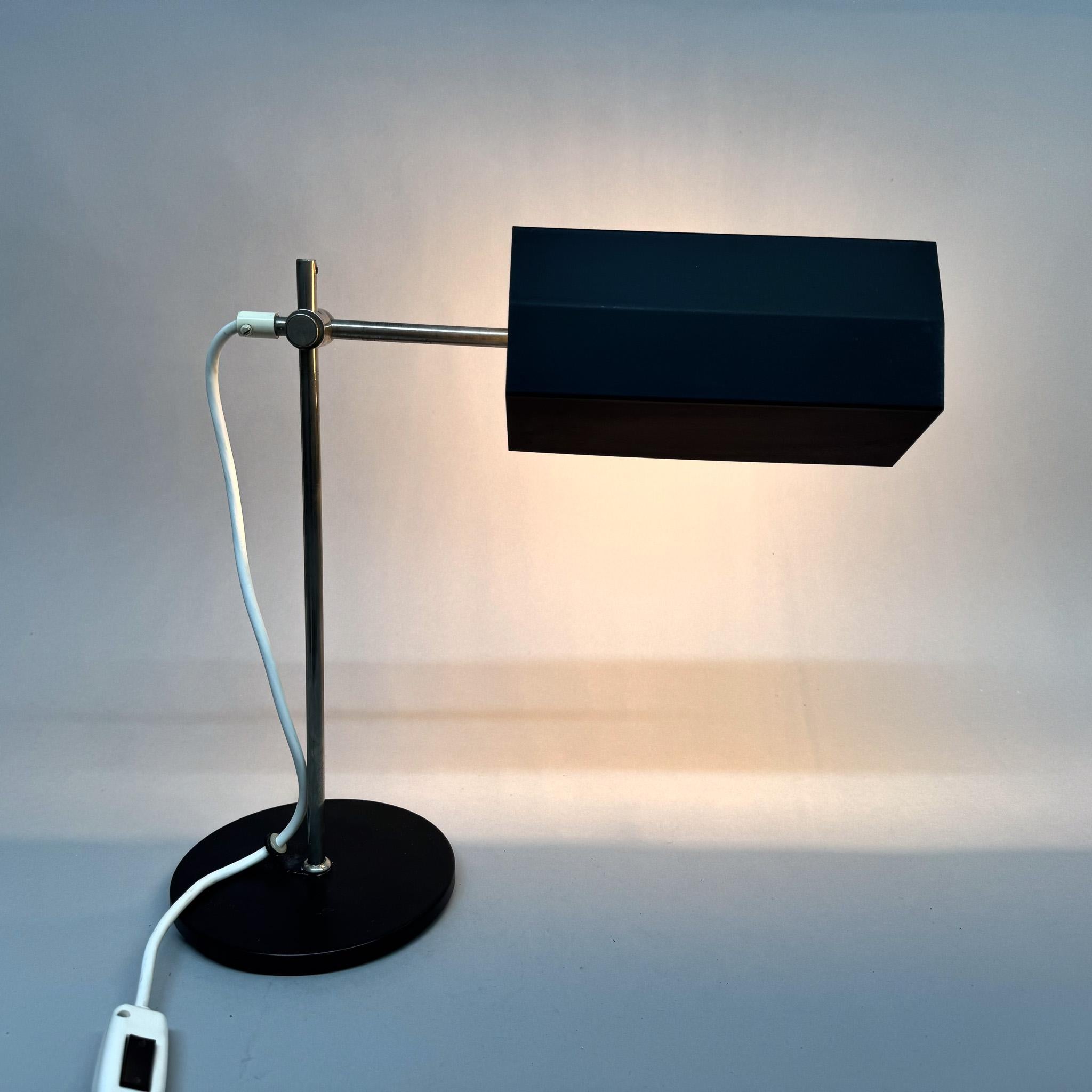 Space age metal table or desk lamp. The shade is adjustable to the sides and can also be moved forward and backward as seen in the photos. Made in former Czechoslovakia in the 1970's. Original, fully functional wiring. Bulbs: 1 x E26 (E27). US