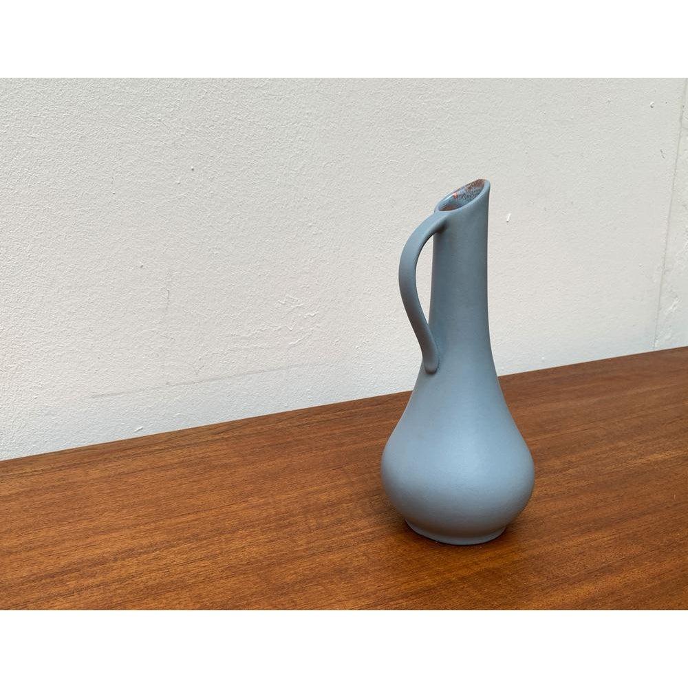 Mid-Century Minimalist German Carafe Vase from Cortendorf, 1960s, in Very Good conditions. Designed 1960 to 1969 Official proof of authenticity such as vintage catalogs, designer records.

Additional information:
Materials: Ceramic
Color: