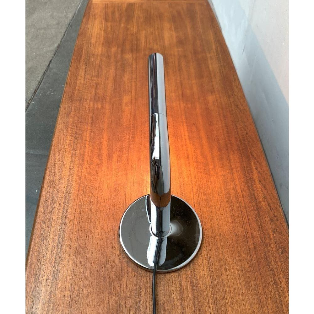 The Gulp is an early design by the well -known luminous designer Ingo Maurer from the late 1960s. A rare piece for light collectors and design lovers.

The design language is simple, which makes this design so timeless and convincing. A pipe that