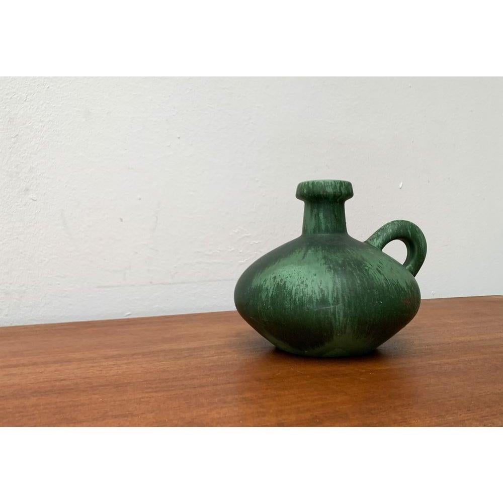Mid-Century Minimalist Pottery Fat Lava Carafe Vase from Otto Keramik, West Germany, 1970s, in Very Good conditions. Designed 1960 to 1969 Official proof of authenticity such as vintage catalogs, designer records.

Additional information:
Materials: