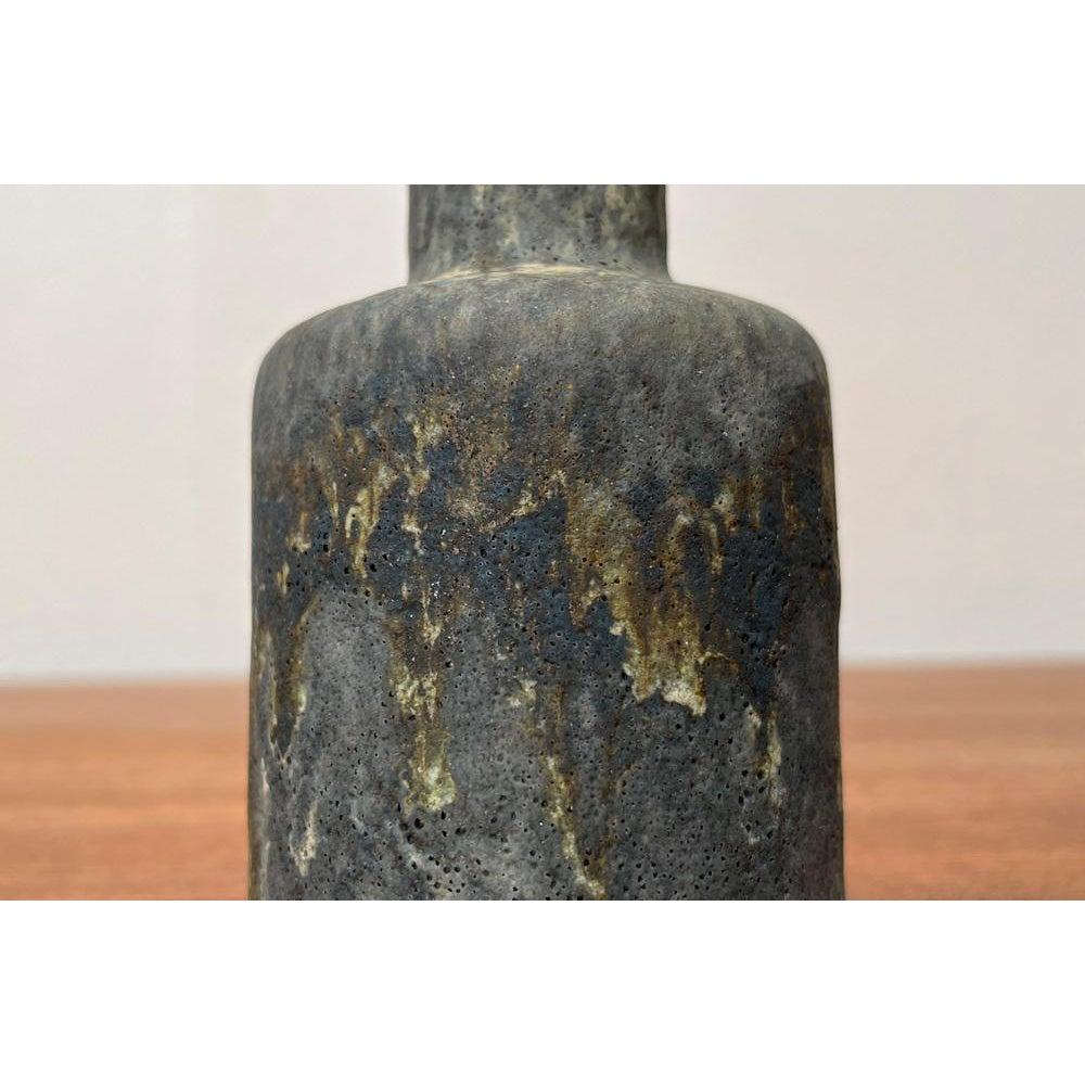 Mid-Century Minimalist Pottery Vase von Ruscha, 1960er Jahre, in sehr gutem Zustand. Entworfen 1960 bis 1969 offizieller Echtheitsnachweis wie z. B. Vintage-Kataloge, Designer-Aufzeichnungen.

Zusätzliche Informationen:
MATERIALIEN: Keramik
Farbe: