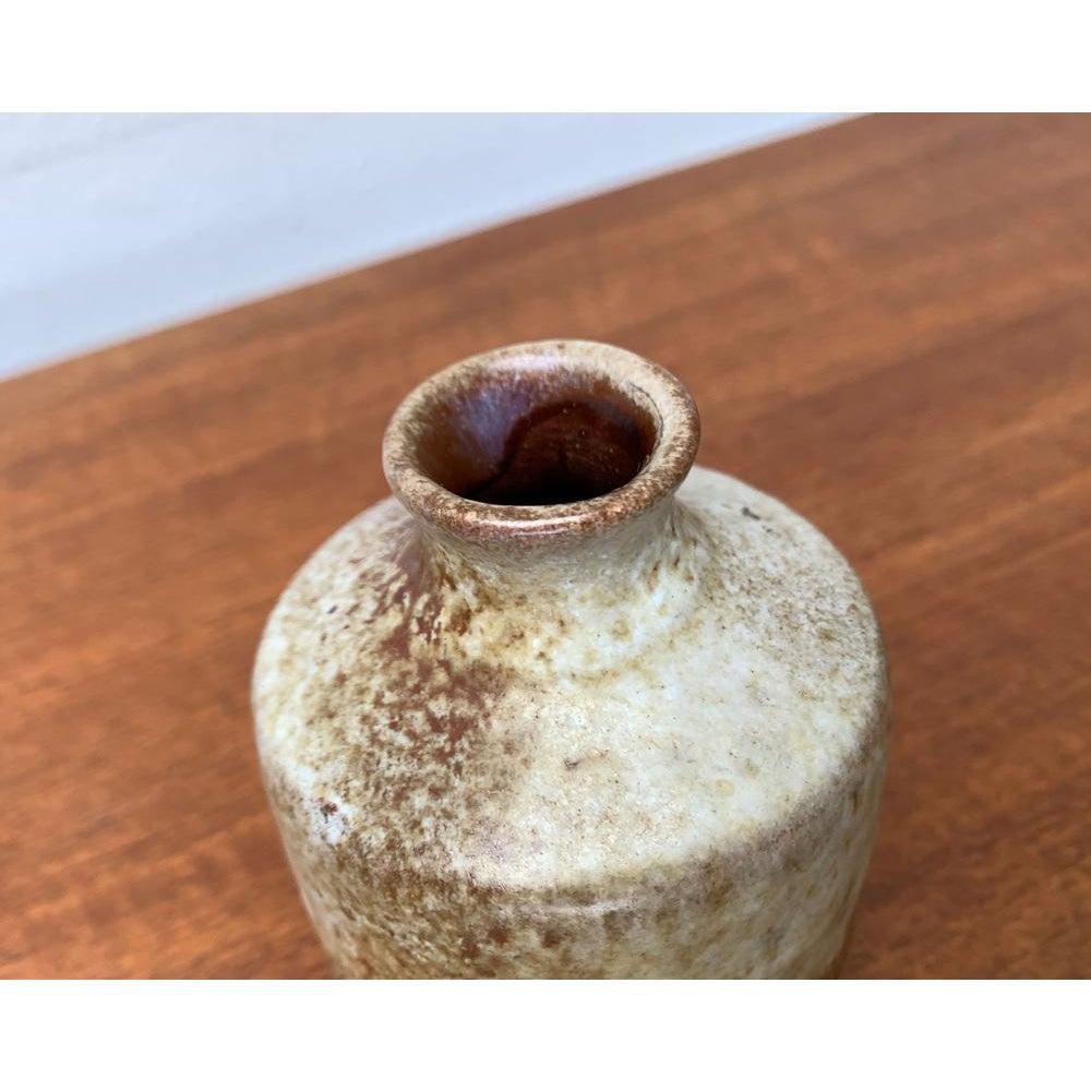 Mid-Century Minimalist Pottery Vase from Ruscha, West Germany, 1960s, in Very Good conditions. Designed 1960 to 1969 official proof of authenticity such as vintage catalogs, designer records.

Additional information:
Materials: Ceramic
Color: