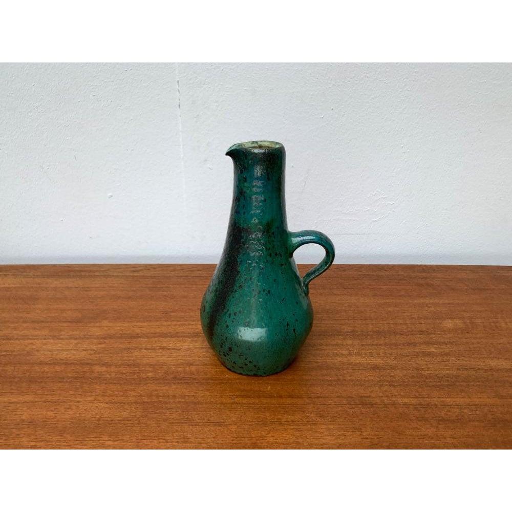 Mid-Century Minimalist Studio Pottery Carafe Vase by Helma Klett for Kunsttöpferei Klett, 1960s, in Very Good conditions. Designed 1960 to 1969 This piece has an attribution markIt is completely authentic 

Additional information:
Materials: