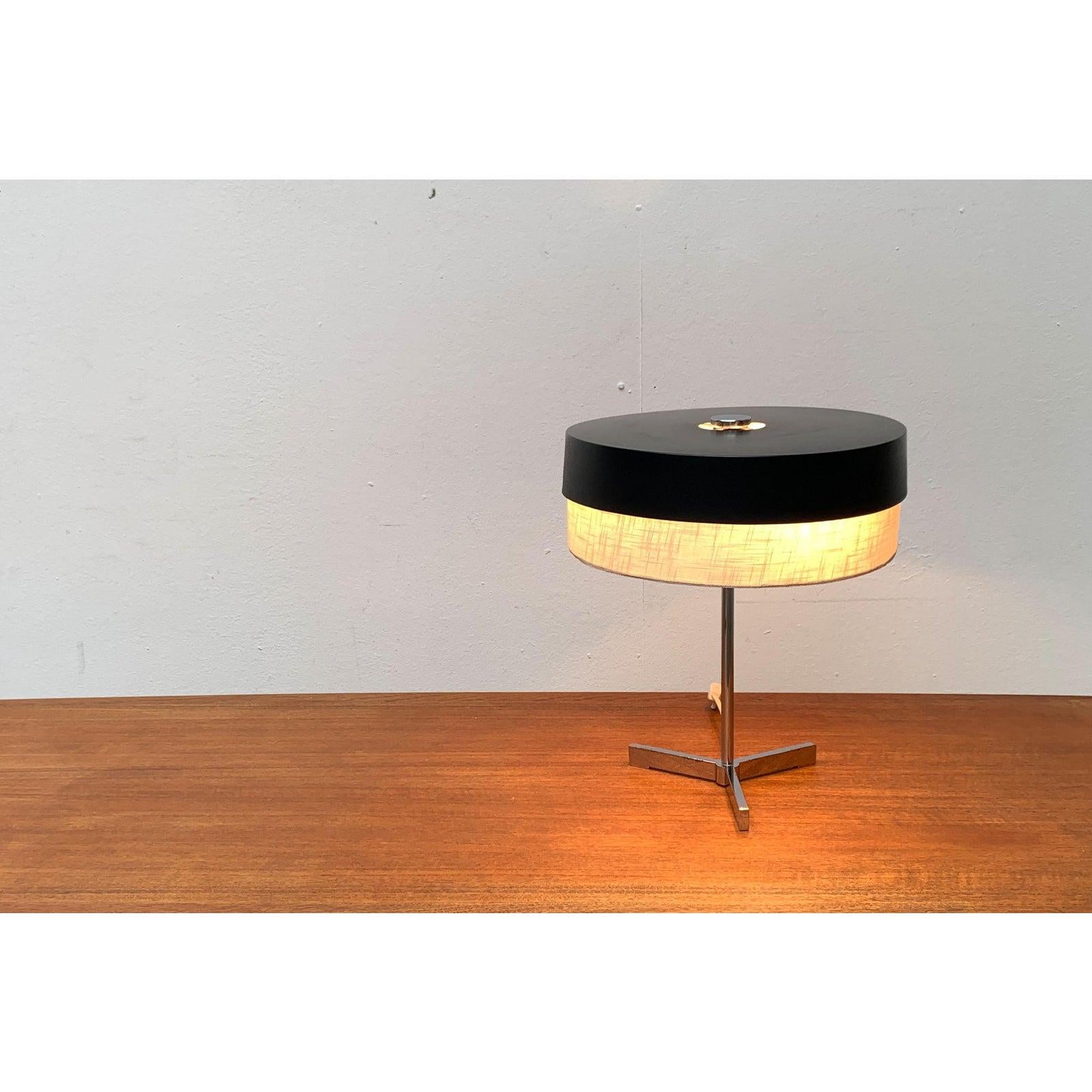 Mid-Century Minimalist Tripod Table Lamp, 1960s, in Very Good conditions. Designed 1960 to 1969. European Plug (up to 250V). The wiring of this item may be original and might need replacement, if not specified otherwise.

Additional