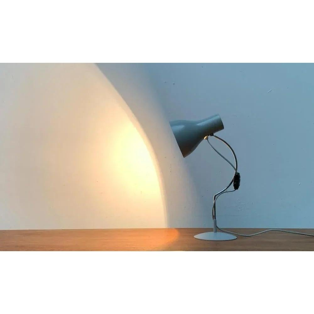 Rare Mid Century table lamps by Napako after a design by Josef Hurka.

A minimalist design. The chrome-coloured shaft is particularly finely executed and widely curved in the upper area. At the bottom, it ends in a simple plate base. The head of the