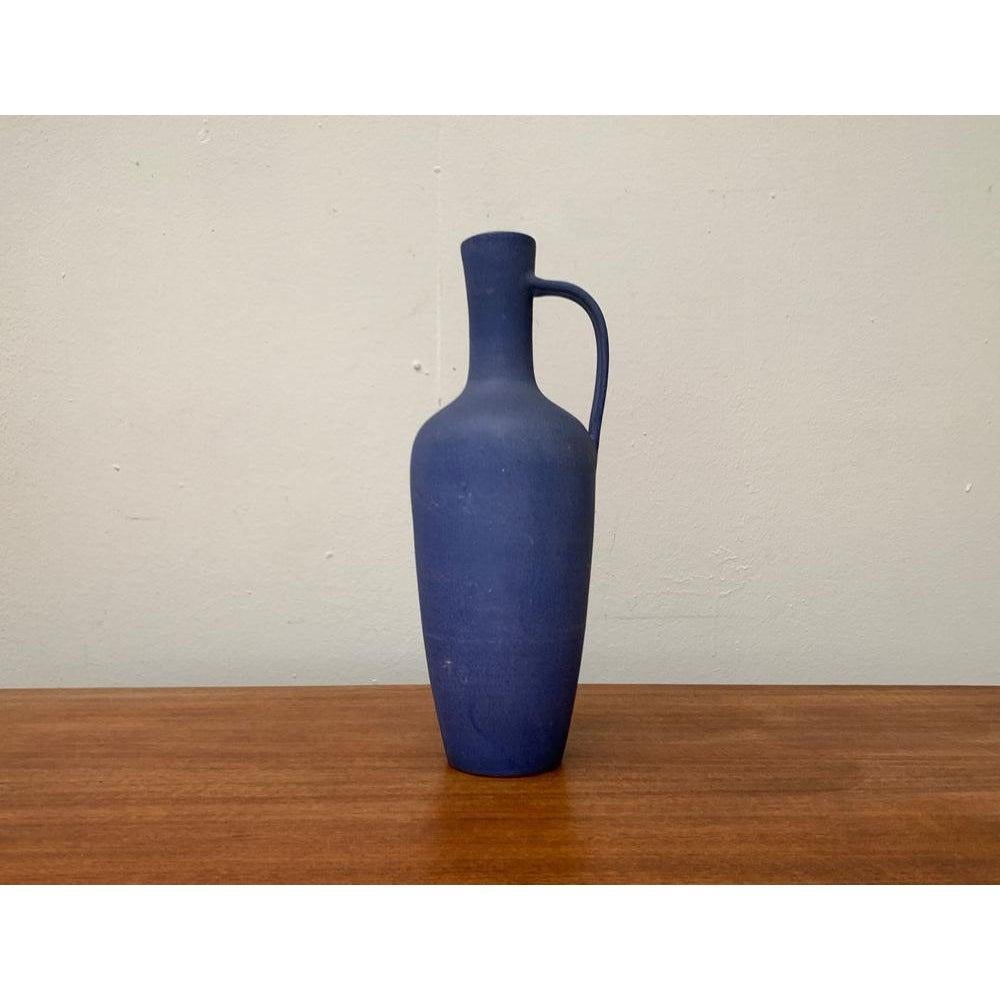 Mid-Century Minimalist WGP West German Pottery Carafe Vase from Marschner Kunsttöpferei, 1960s, in Very Good conditions. Designed 1960 to 1969 This piece has an attribution mark.

Additional information:
Materials: Ceramic
Color: Blue
Styles: