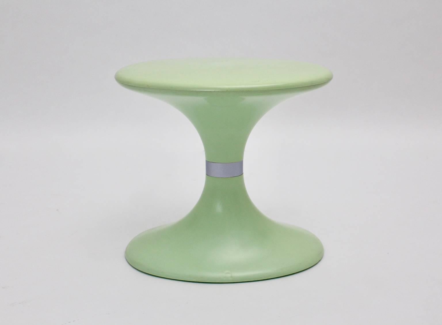 A rare pistachio green colored plastic stool or ottoman designed by Carrara & Matta model Senna from the 1970s.
The color is pistachio green with a metal ribbon in the middle of the stool.
Stamped inside with Carrara & Matta, Made in Italy
The