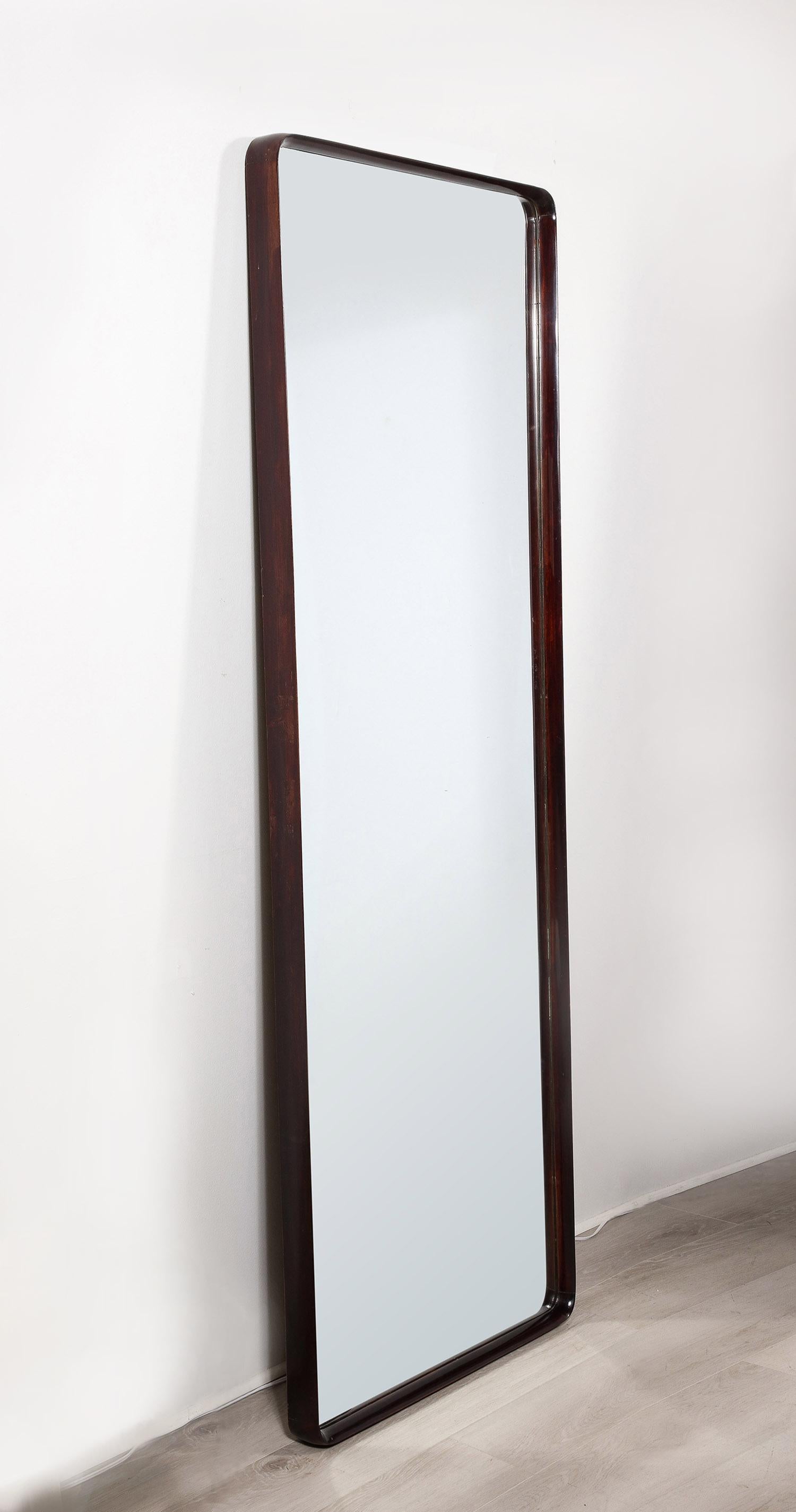 The mahogany mirror with curved edge. Can be shown vertically or horizontally