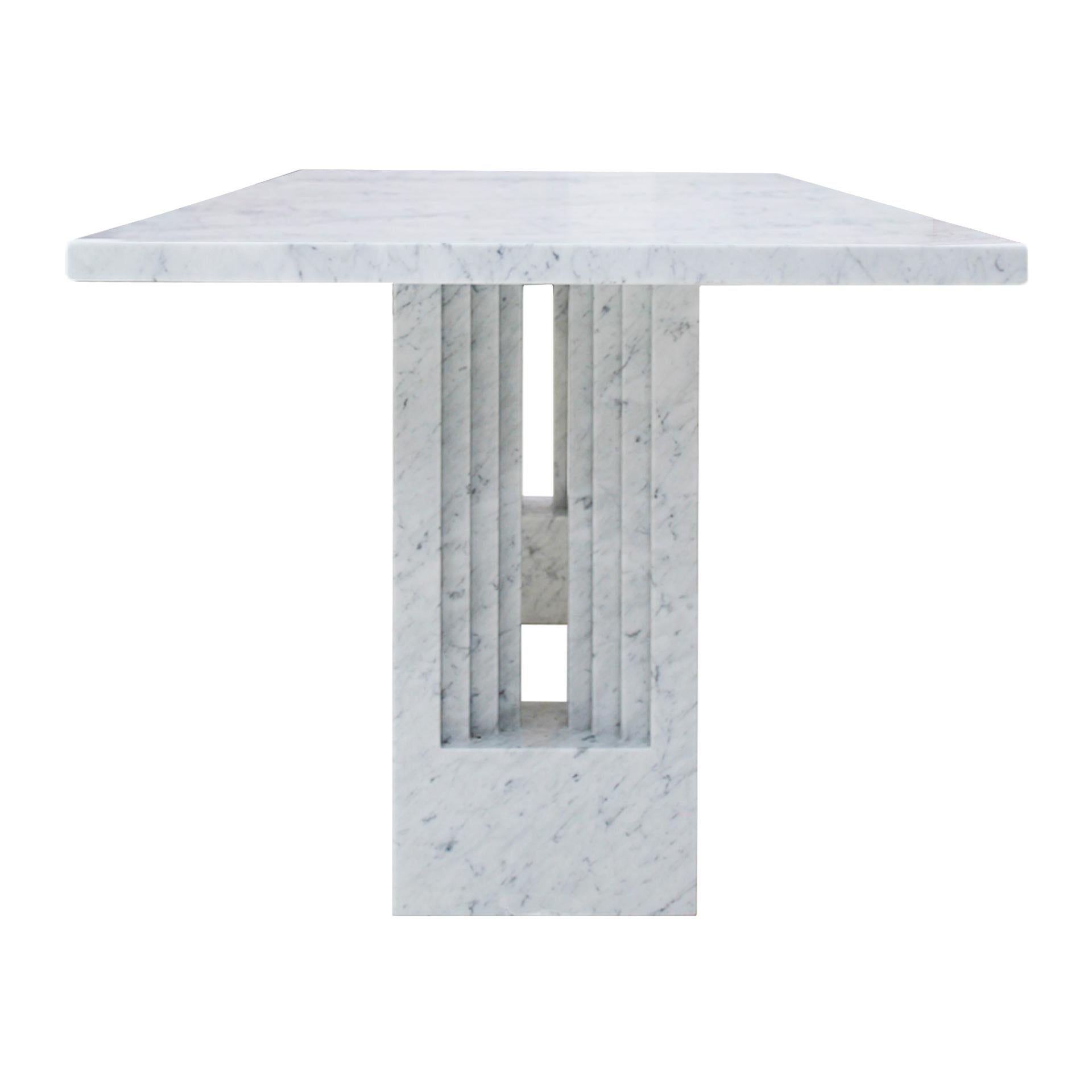 Dining table mod. Delfi designed by Carlo Scarpa and Marcel Breuer for Gavina. Composed of two sculptural bases and a rectangular envelope 4 cm thick. Made in Carrara marble. Italy 1968.

Our main target is customer satisfaction, so we include in