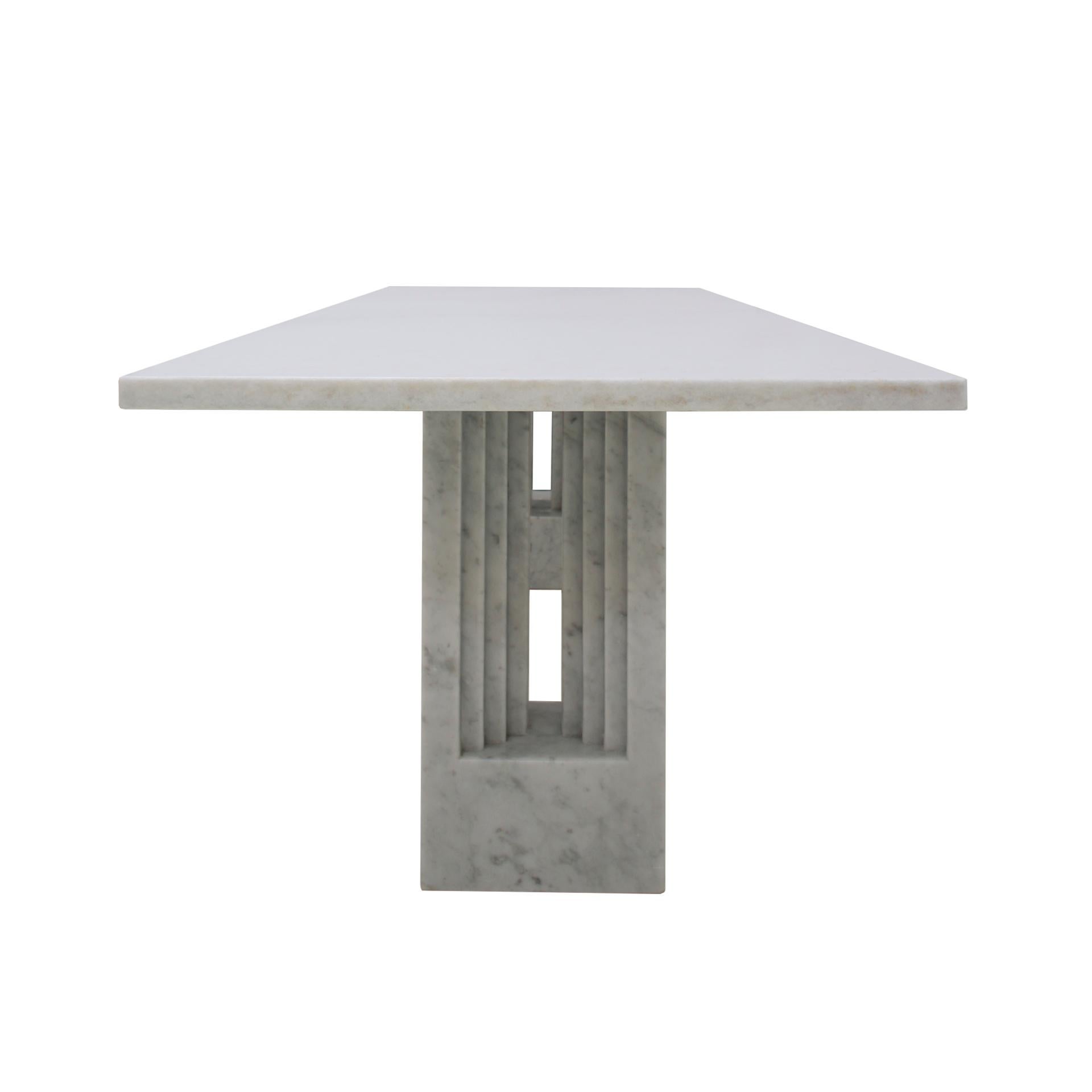 Dining table mod. Delfi designed by Carlo Scarpa and Marcel Breuer for Gavina. Composed of two sculptural bases and a rectangular top 4 cm thick. Made in Carrara marble. Italy 1968. From the Banca Antoniana of Padova and Trieste.

Our main target is