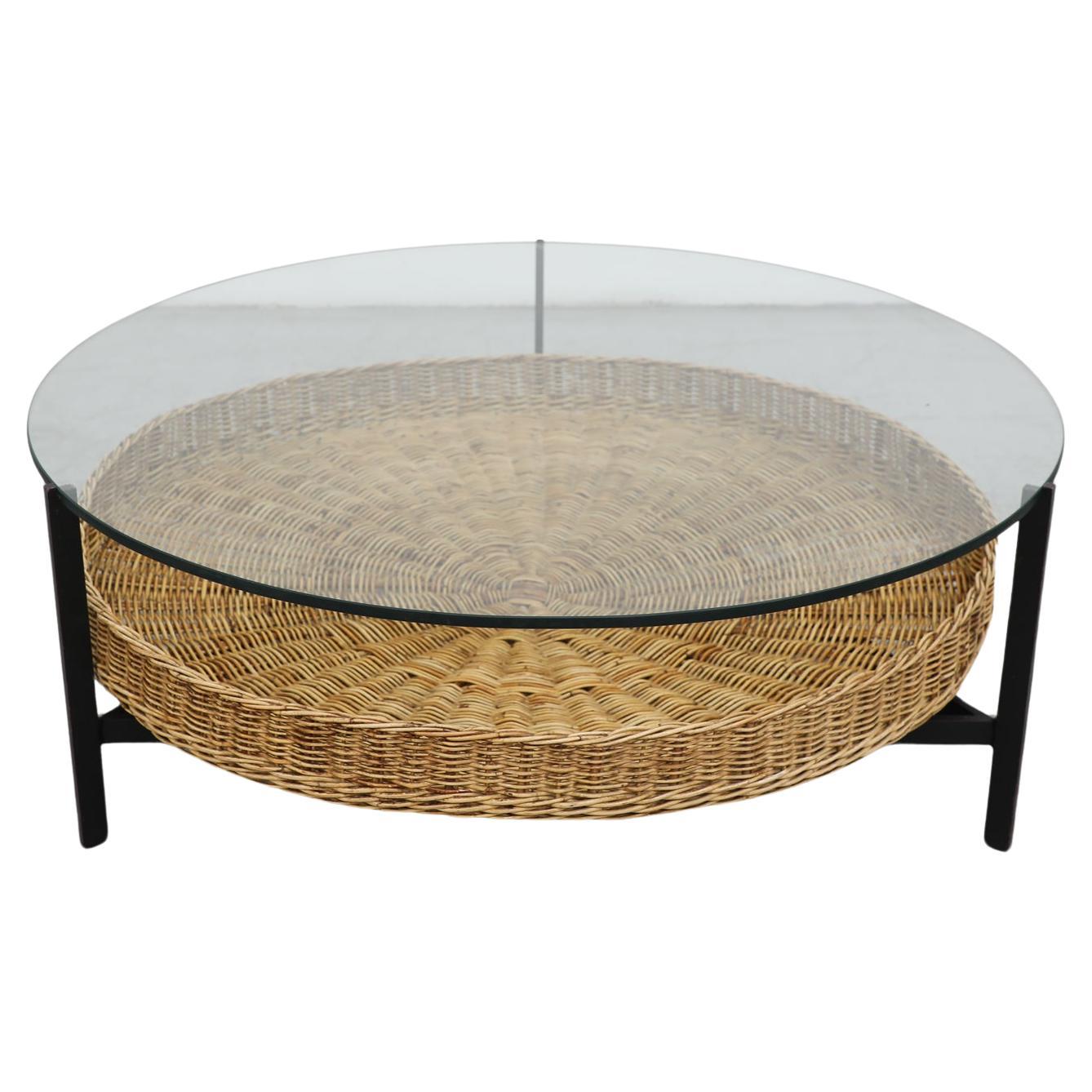 Mid century "model 743" round coffee table with rattan magazine basket