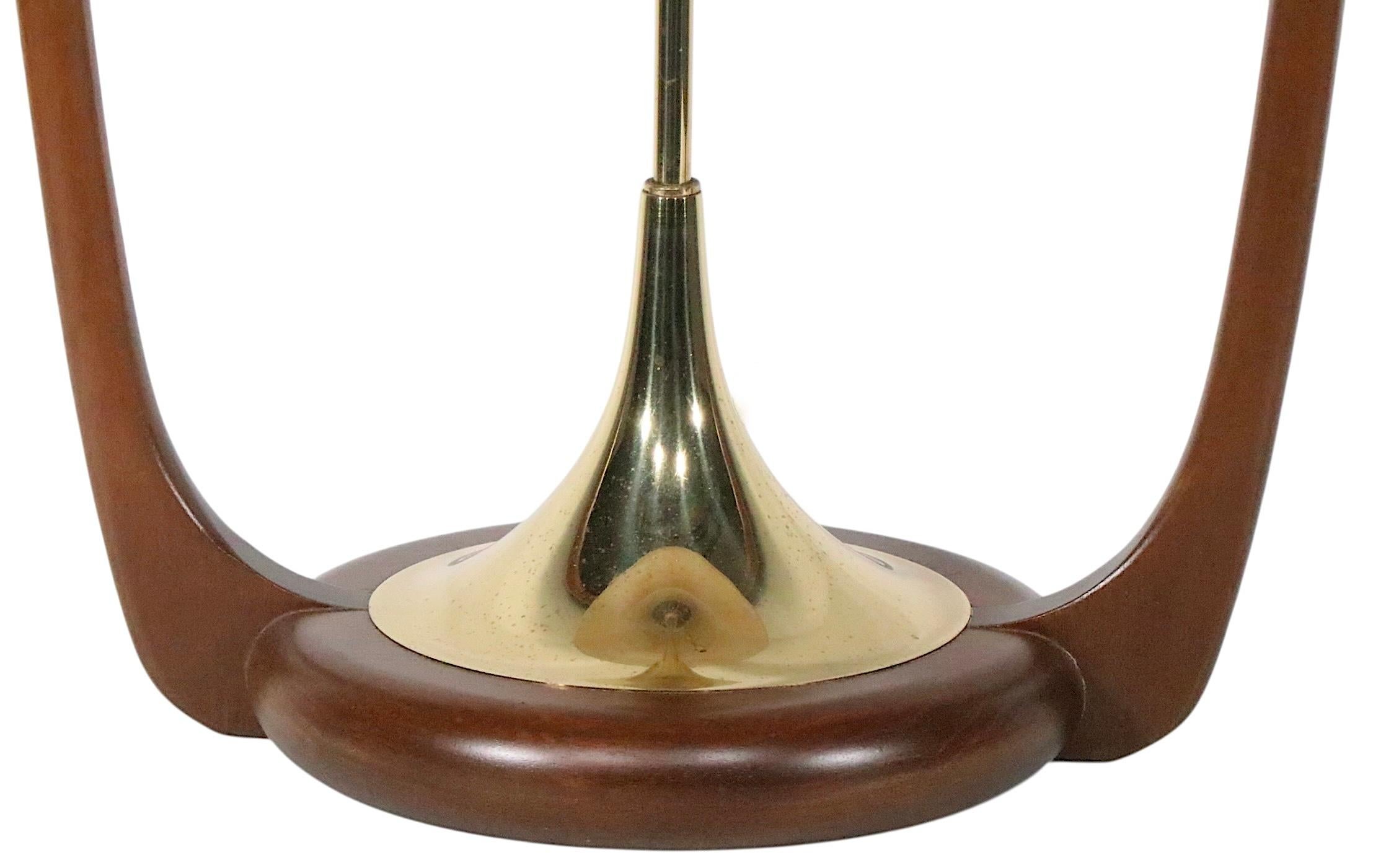 Incredible mid century table lamp, designed by Arthur Jacobs for the  Modeline Lamp Company, circa 1950's. Considered the pinnacle of American lamp design, this piece is truly a collector grade gem.  The lamp is in mint/near mint condition, we have