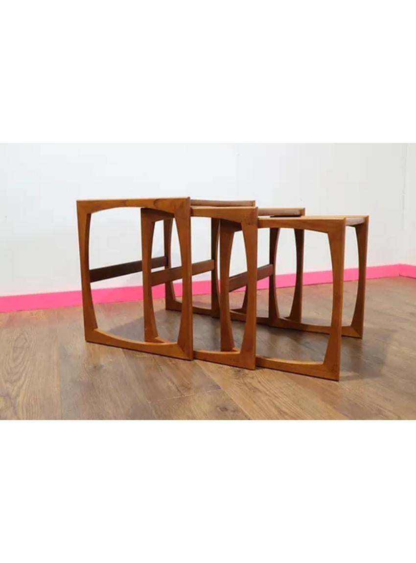 Set of 3 nesting tables in the classic style by G-Plan are part of the quadrille range with teak tops and solid teak framework the tables are in great original condition.