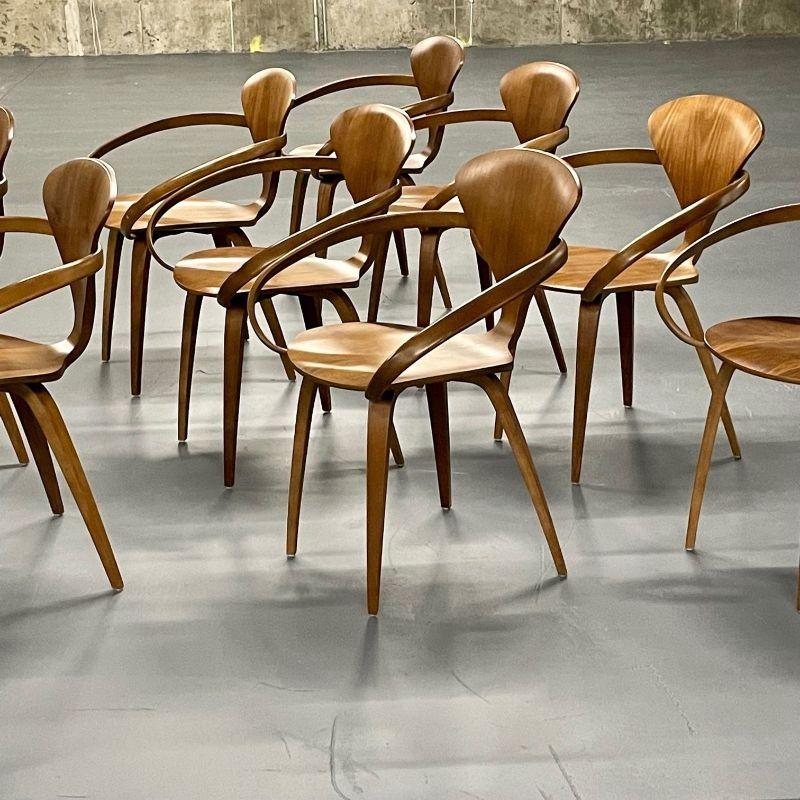 Mid-Century Modern Set of 10 Pretzel chairs/Armchairs by Norman Cherner for Plycraft

U.S.A. (1920–1987) A pioneer both in molded plywood and prefab housing, Norman Cherner studied and taught at the Columbia University Fine Arts Department and was