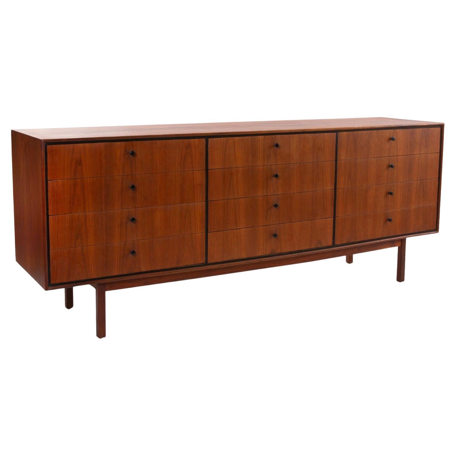 Milo Baughman for Arch Gordon 12 drawer long Walnut dresser. Very nice walnut Veneer dresser with black brass pulls on a solid walnut 4 square leg base. Very nice design with lots of storage. Made in USA circa 1960. Located in Brooklyn