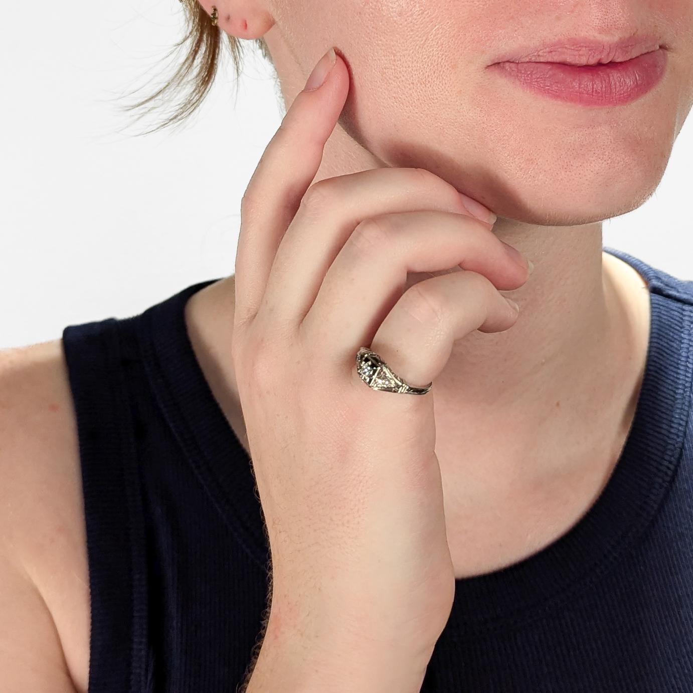 A fine Mid-Century Modern gold ring.

In 18 karat white gold.

Prong-set with a ca. 3.3mm diameter round cut white diamond in an illusion setting.

Marked 18K to the shank.

Simply a wonderful Mid-Century engagement ring!

Date:
Mid-20th
