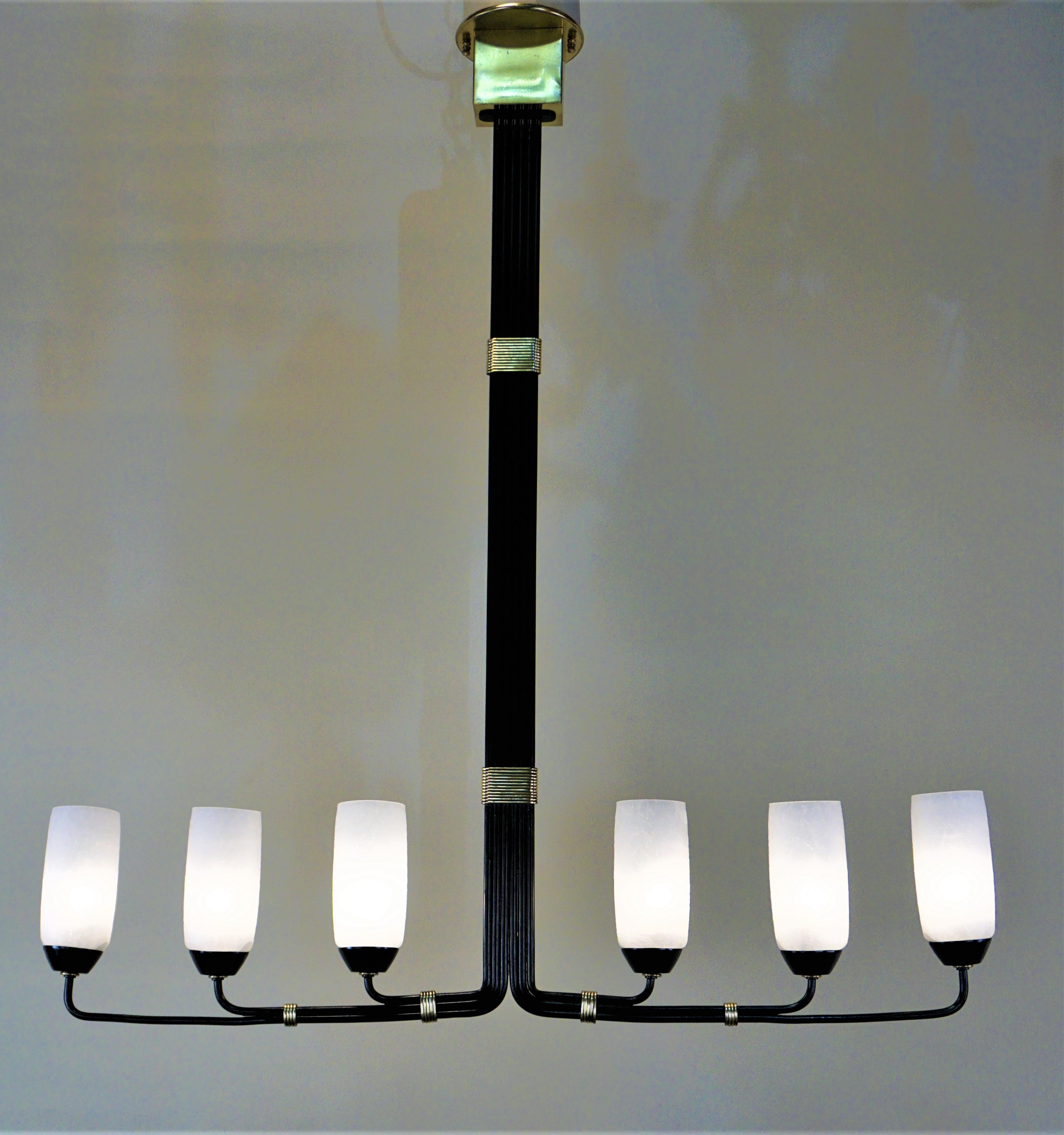 A fantastic midcentury 1950s modern Italian chandelier with six texture glass and black lacquer, polished bronze.