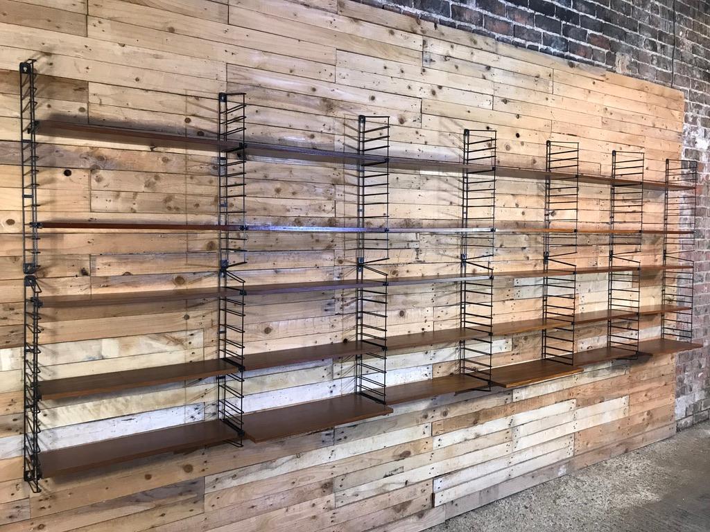 Stunning sought after extra large Tomado rack in very good vintage condition, A very large set of 14 ladders and 30 shelves (three deeper ones) This will be the largest set available worldwide!.

This set is in super condition, no damage to the