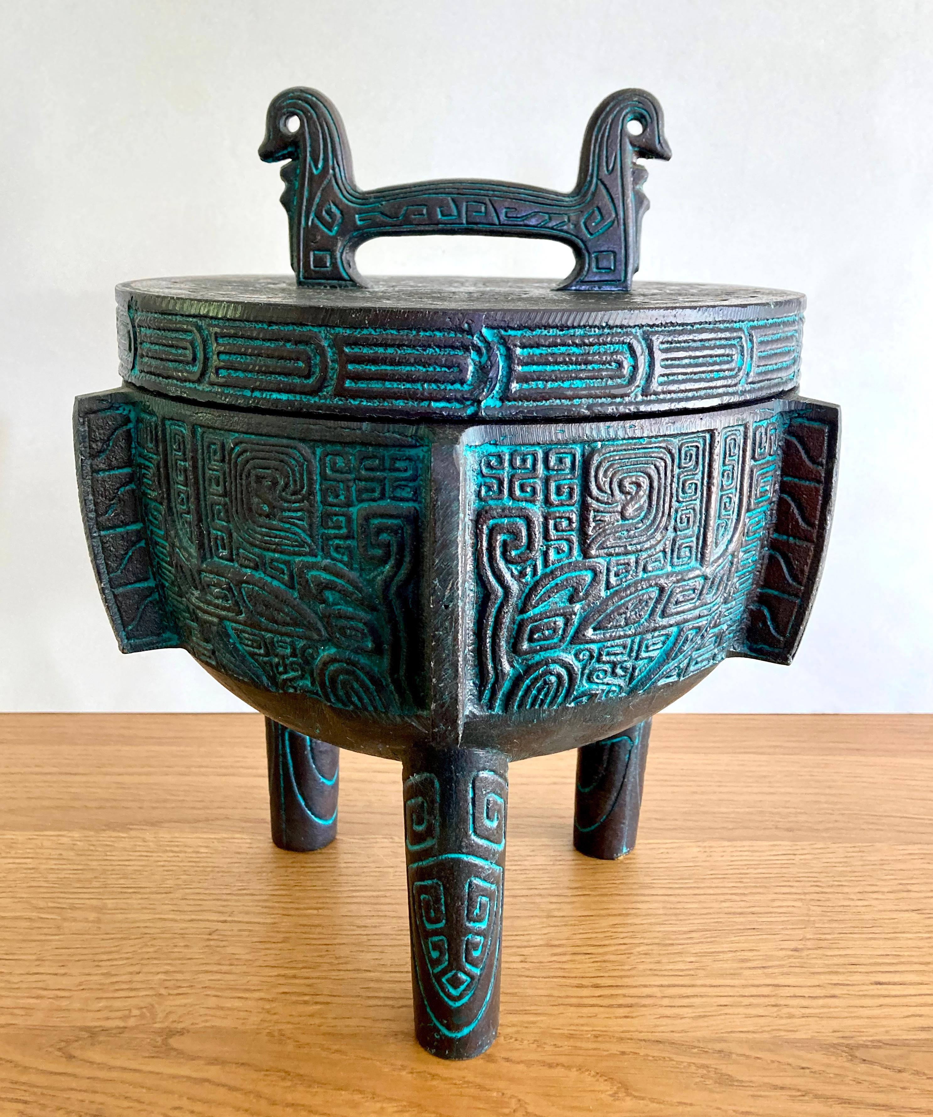 A mid-century modern design icon: the desirable ice bucket by American designer James Mont made in the 1960s. Due to its ethnic design and elaborate, exotic relief pattern, this model is often referred to as his Burmese ice bucket. The bucket is