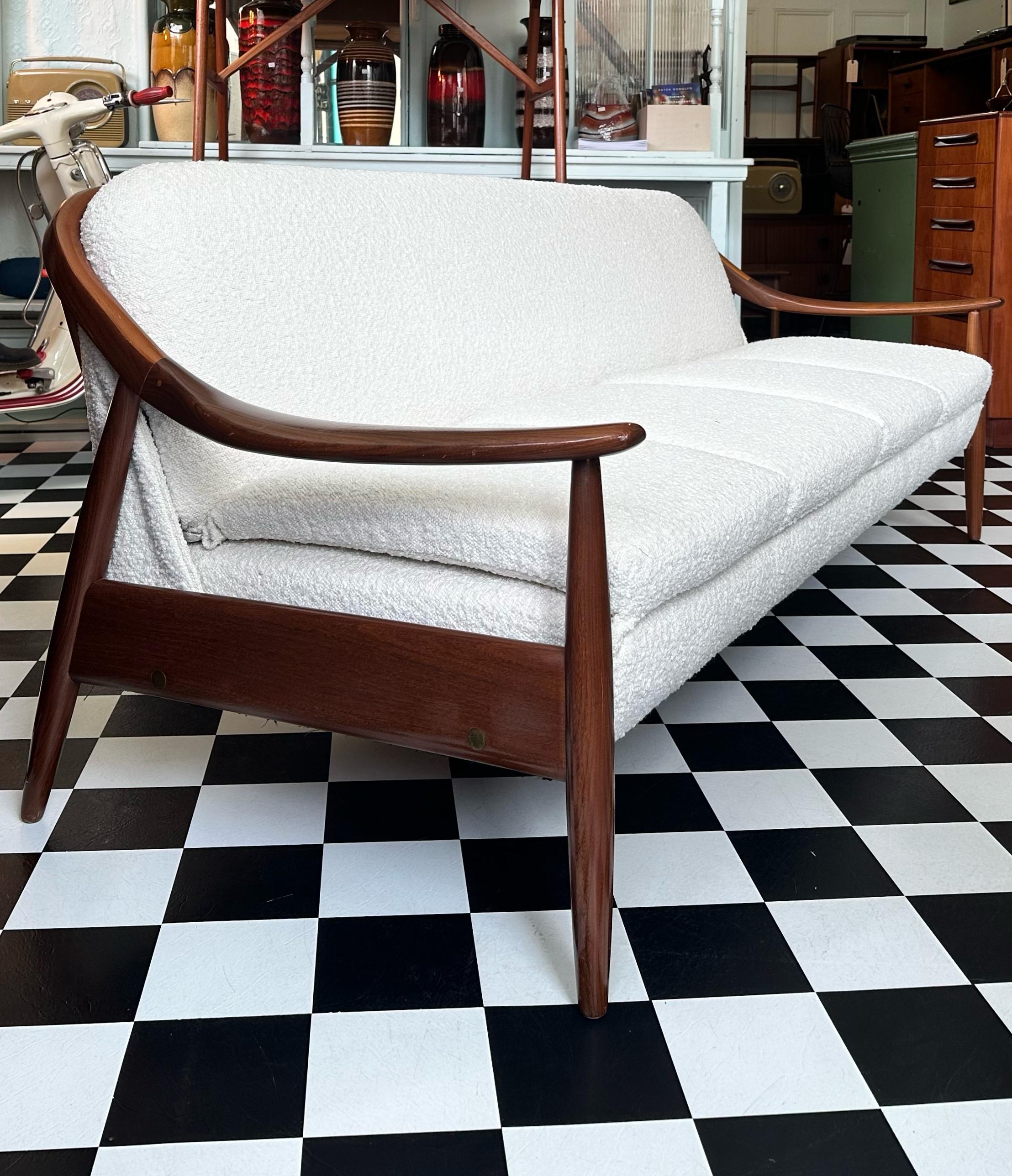 We’re happy to provide our own competitive shipping quotes with trusted couriers. Please message us with your postcode for a more accurate price. Thank you.

This stunning mid-century sofa bed was manufactured in the 1960s by Greaves &