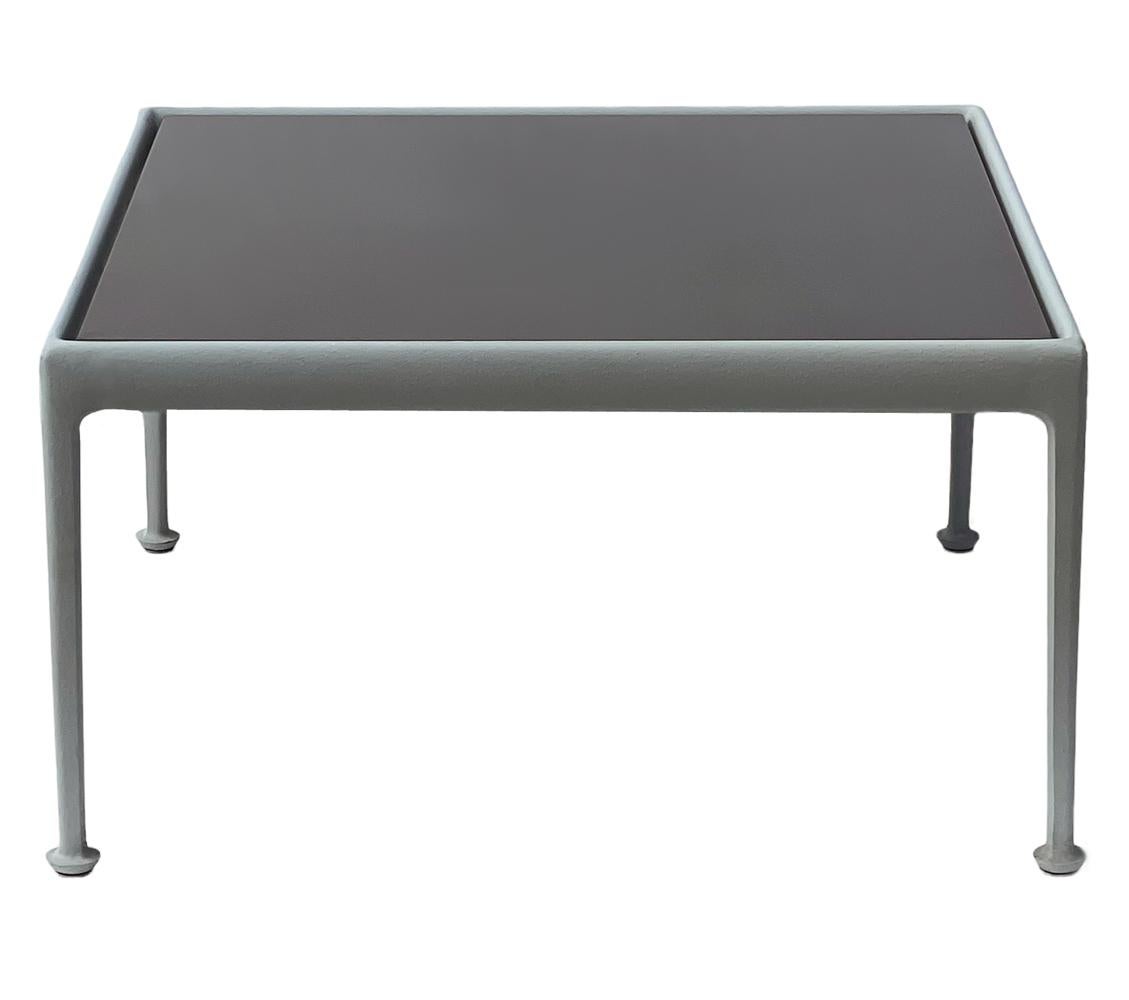 A classic outdoor low cocktail table designed by Richard Schultz for Knoll. It features gray frame with chocolate brown porcelain top. Clean ready to use condition.