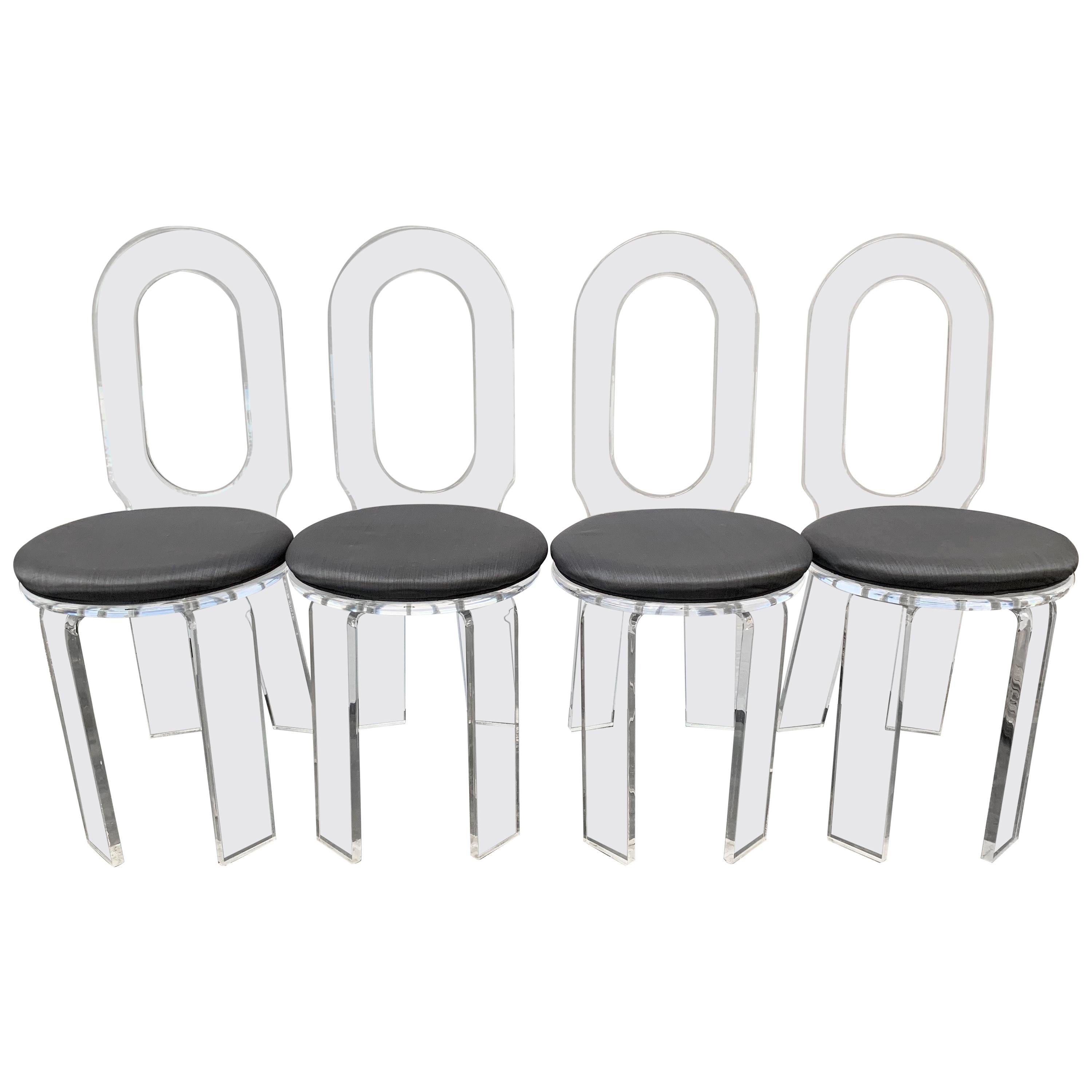 Set of Four Lucite Chairs at 1stDibs