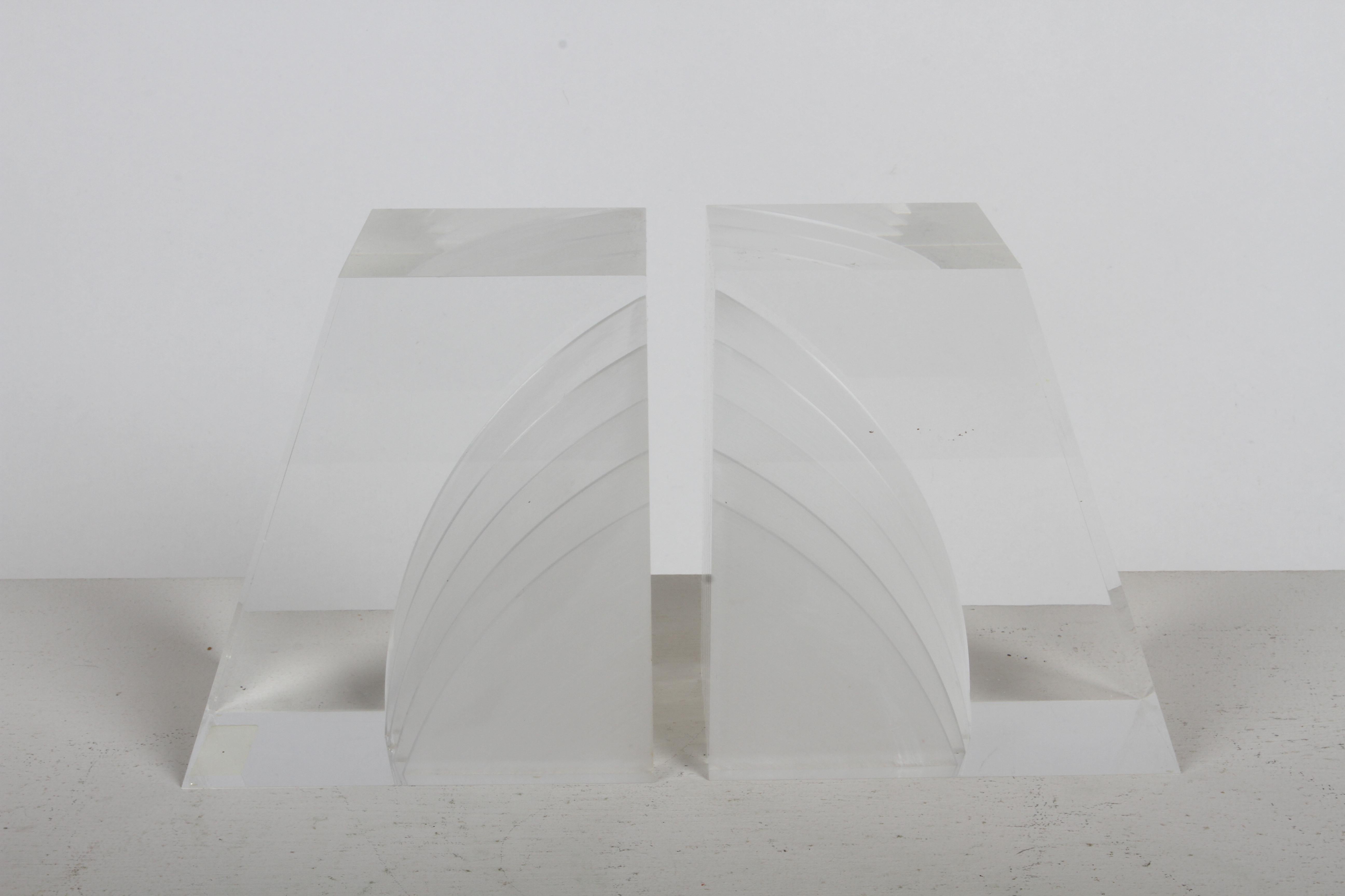 Pair of MCM 1970s Herb Ritts for Astrolite designed clear & frosted lucite Trapezoid shaped bookends.  In fine condition, no damage. no Label. In fine condition, no issues. 