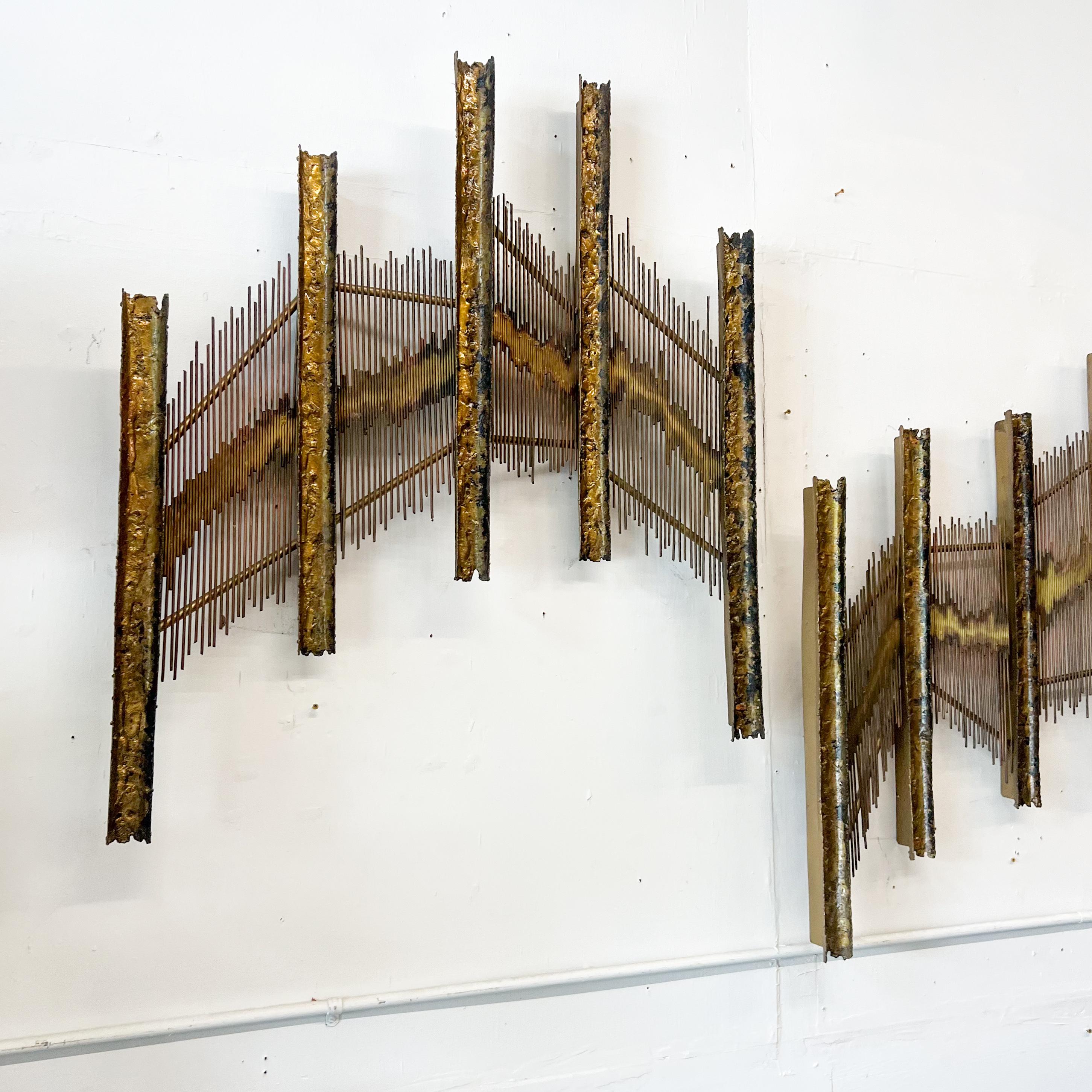 Elevate your space with this exceptional mid-century modern brutalist style metal art, crafted by A. Raphael. This rare three-piece set makes a bold statement with its intricate and textured design. Each piece is substantial and very heavy,