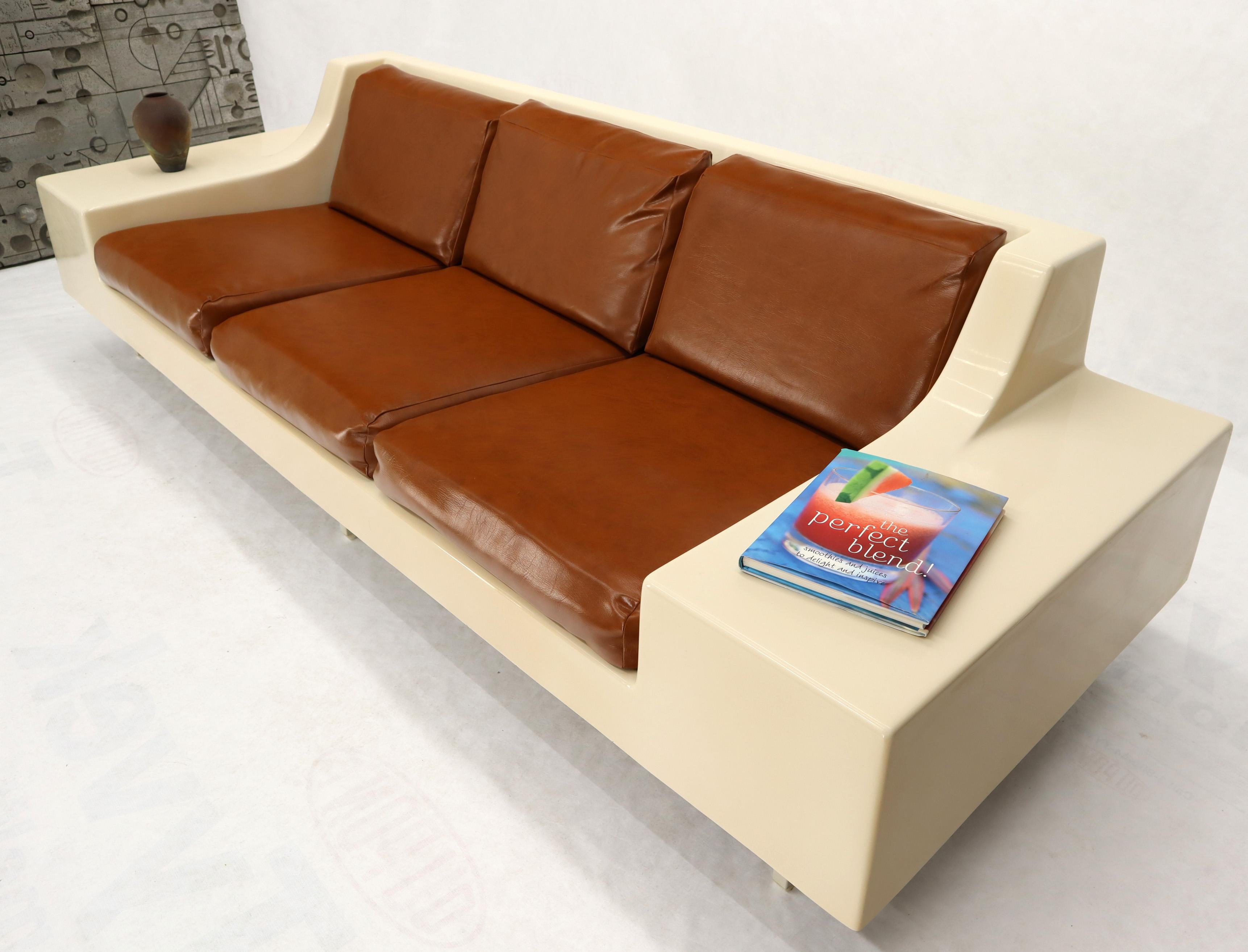 Mid-Century Modern fiberglass sofa attributed to Steelcase. Nice proportions with in nightstands.