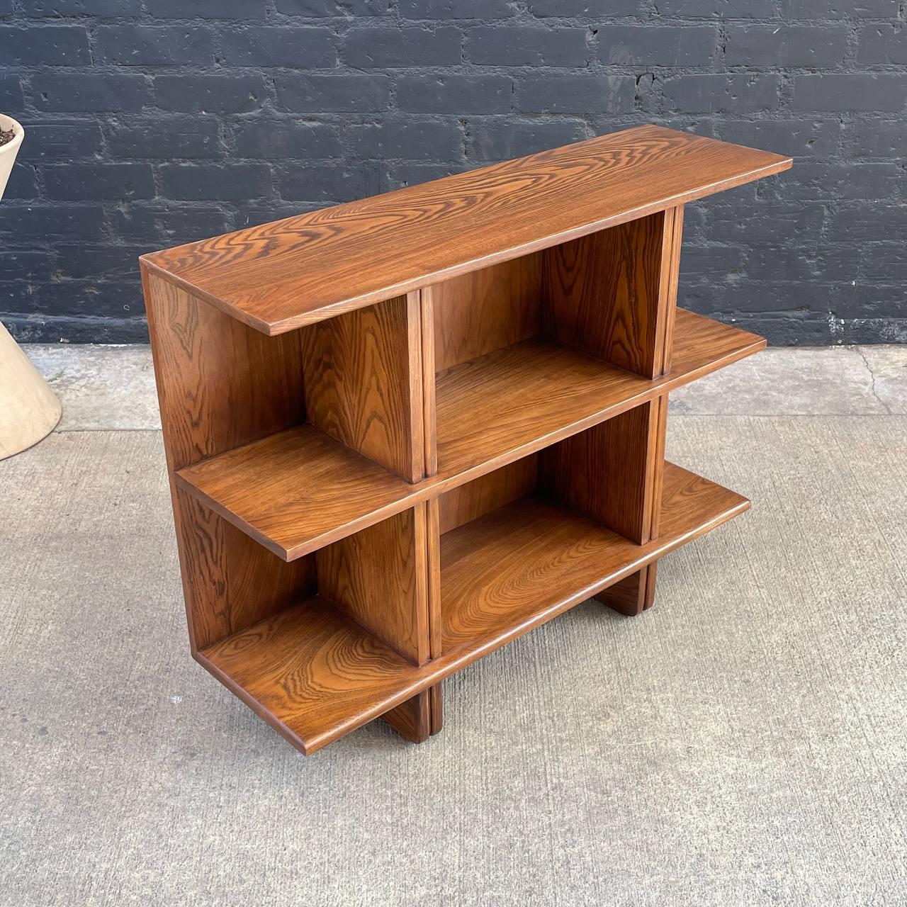Newly Refinished - Mid-Century Modern 3-Tier Bookshelf Credenza

With over 15 years of experience, our workshop has followed a careful process of restoration, showcasing our passion and creativity for vintage designs that can seamlessly be