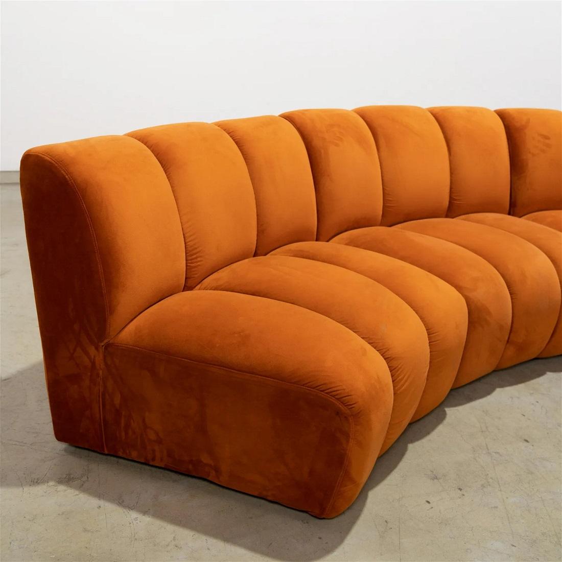 Modern four-piece channeled back sectional sofa. Curved and has the original orange velvet upholstery.
Each section - 31