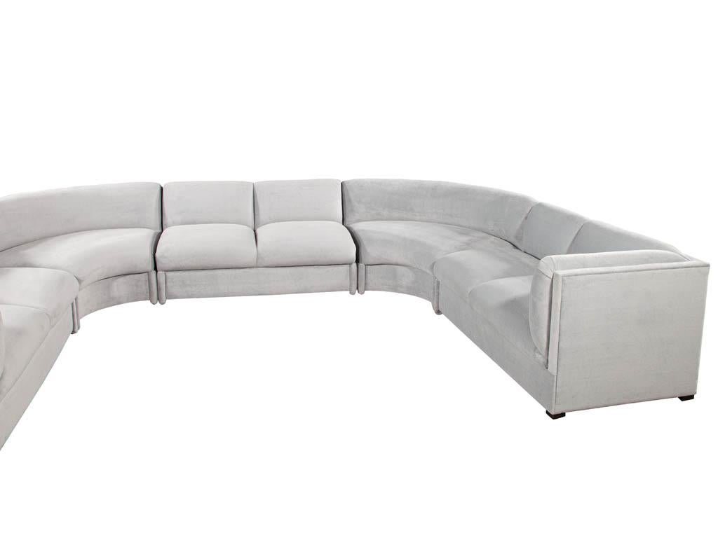 Mid-Century Modern sectional sofa by Weiman. This 5-piece sectional has been completely restored by the professionals at Carrocel with all new foam and fabric material. Thick plump cushions finished in a luxurious grey velvet with a hint of pale