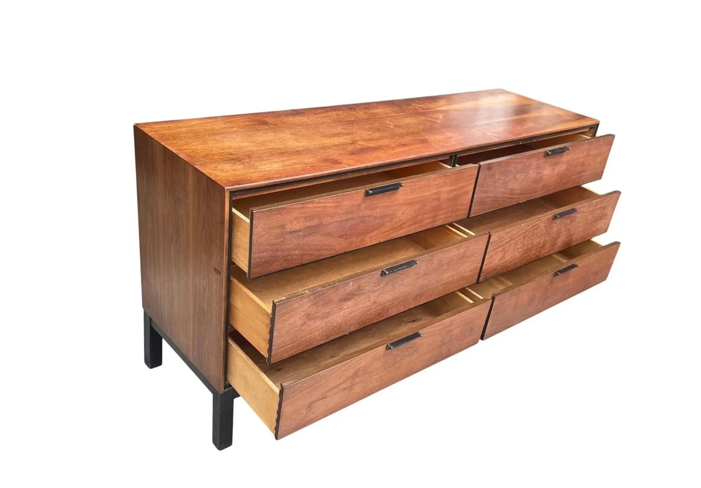 American Mid Century Modern 6 drawer walnut low dresser with black lacquered wood base For Sale