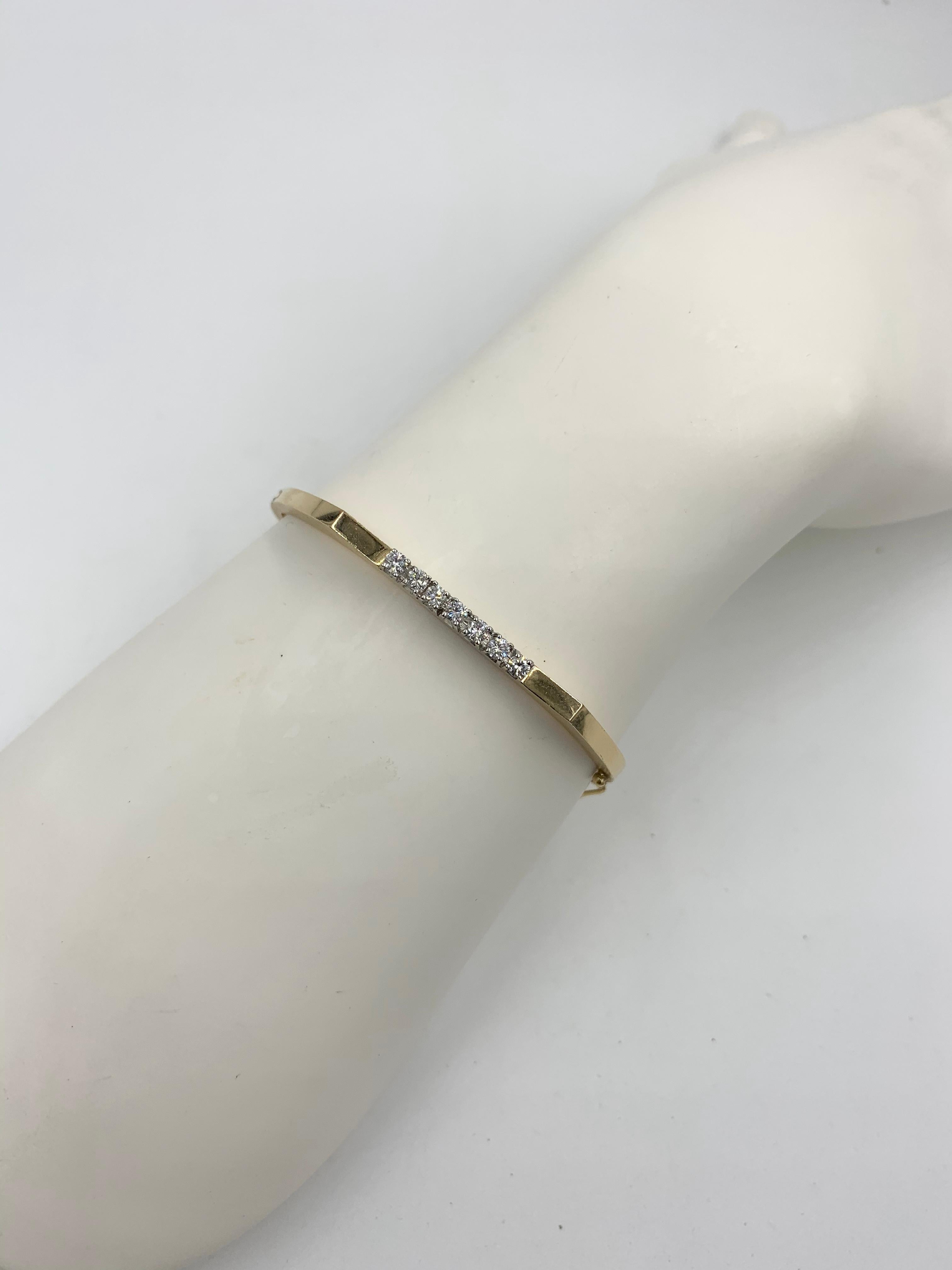 Women's Mid-Century Modern 7 Diamond Bangle Bracelet 14 Karat Yellow Gold For Sale